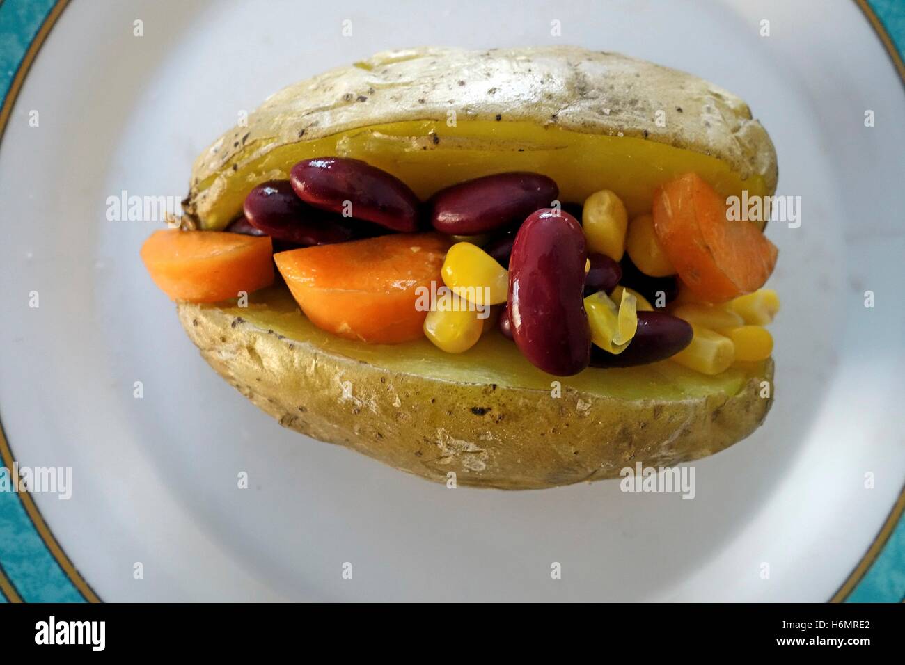 Jacket Potato with Red Kidney Beans, Carrot and Sweetcorn Stock Photo