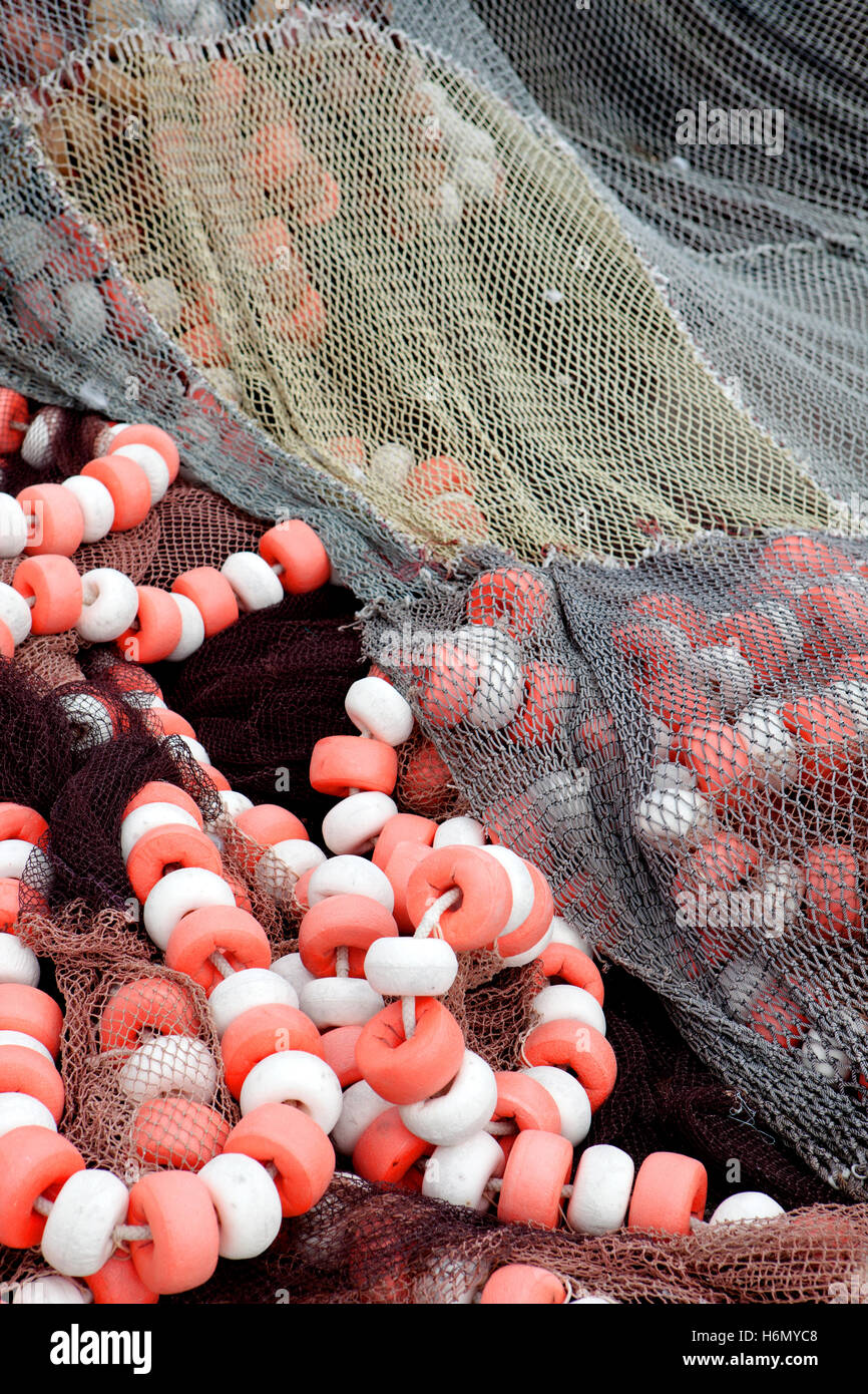Red white fishing nets at hi-res stock photography and images