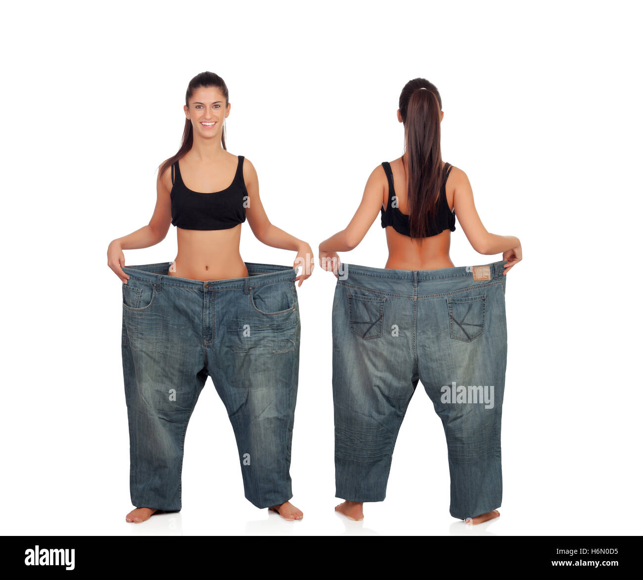 View ahead and behind thin girl with big pants isolated on a white background Stock Photo