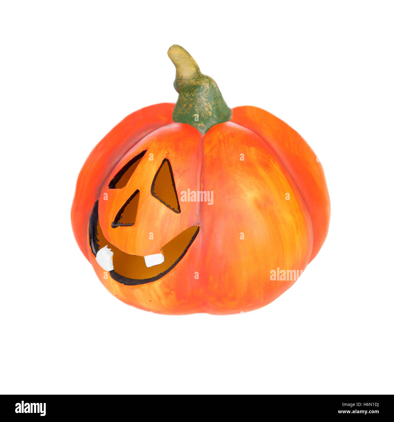 Big pumpkin with laughing face isolated on a white background Stock Photo