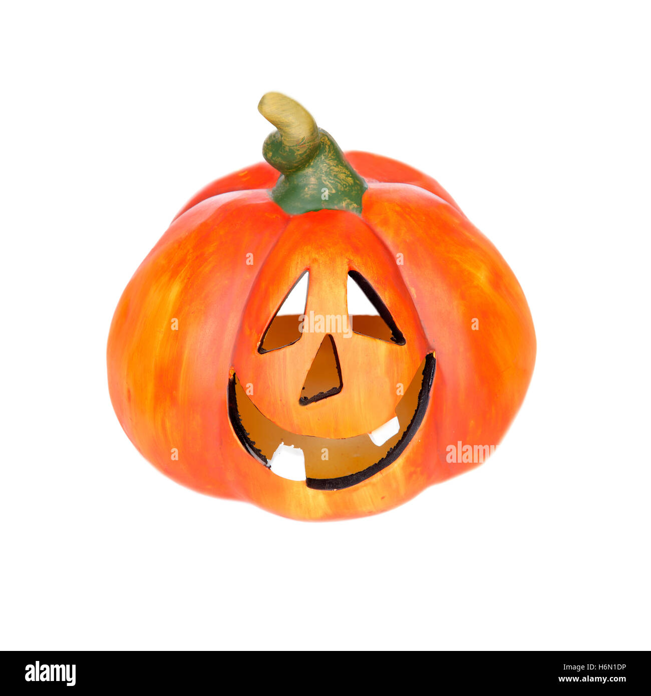 Big pumpkin with laughing face isolated on a white background Stock Photo