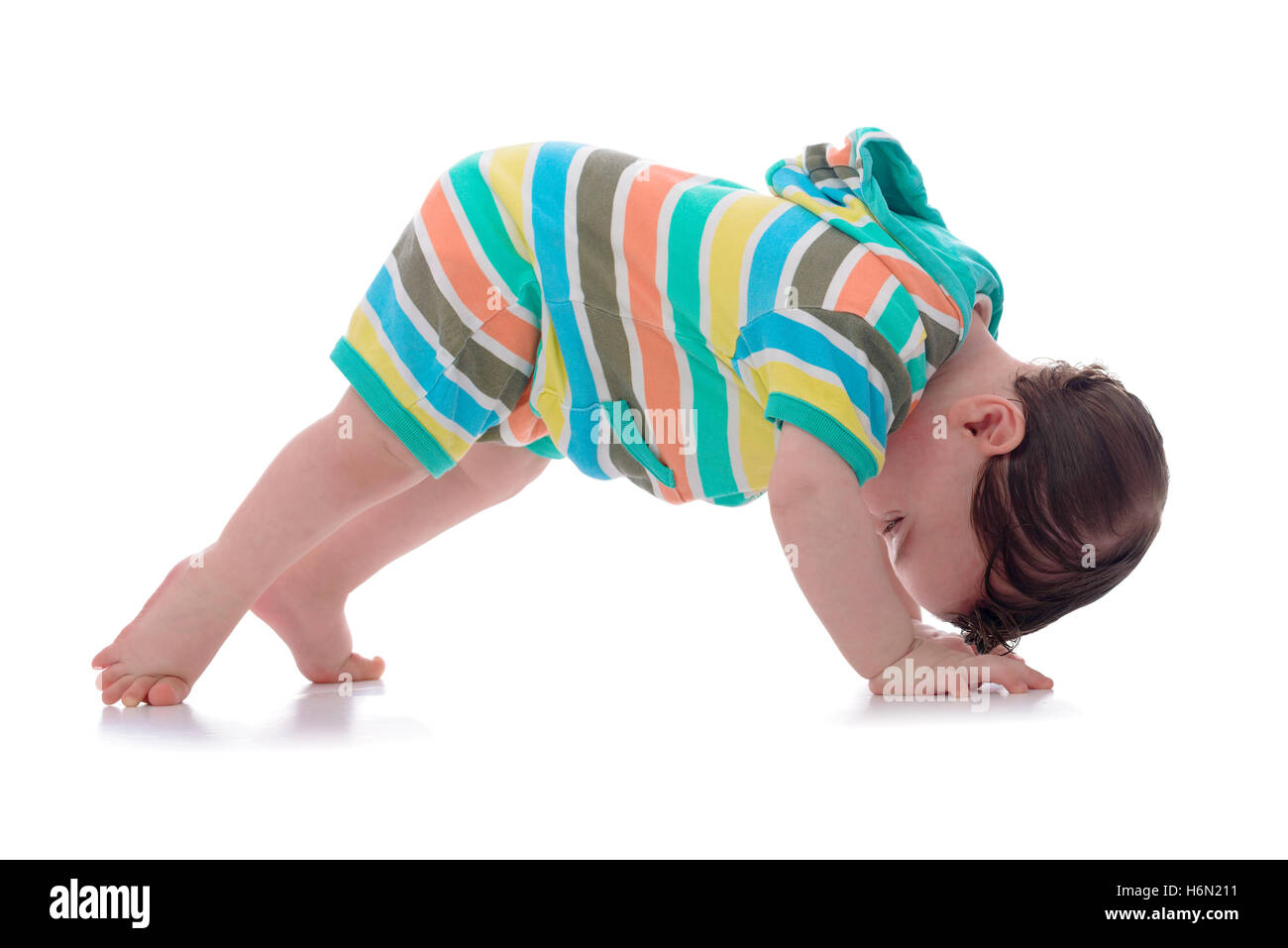 Crawling Baby Looking Backwards Isolated on White Background Stock