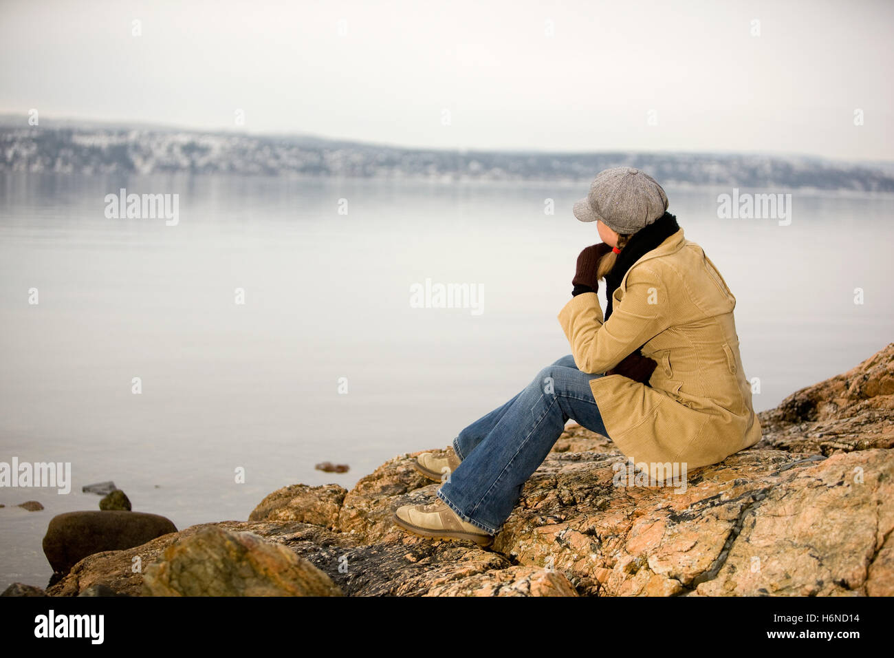 woman beautiful beauteously nice female winter future person look glancing see view looking peeking looking at cold catarrh Stock Photo