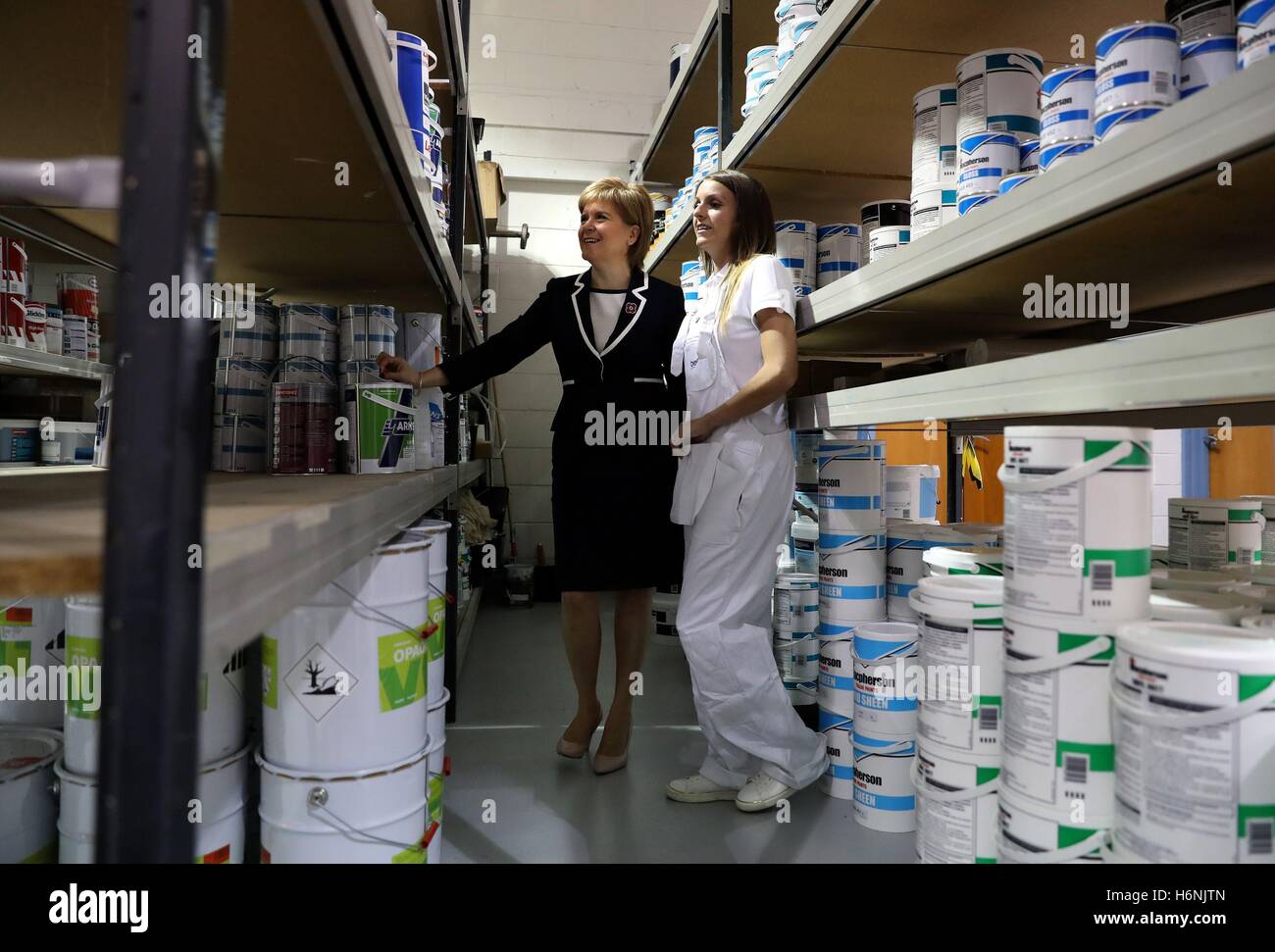 Scotland's First Minister Nicola Sturgeon is shown paints with painter