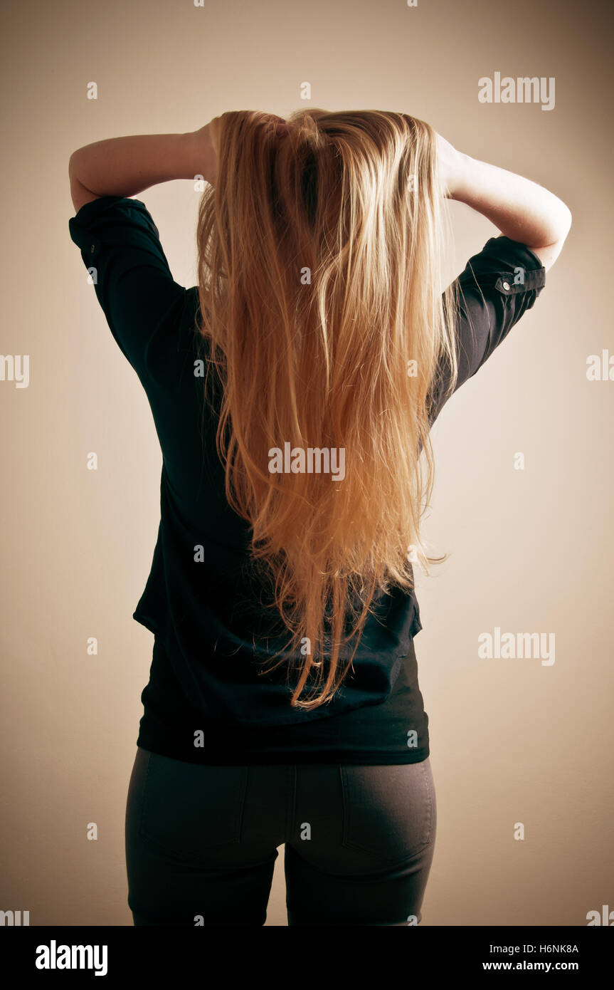 Long straight blonde hair hi-res stock photography and images - Alamy