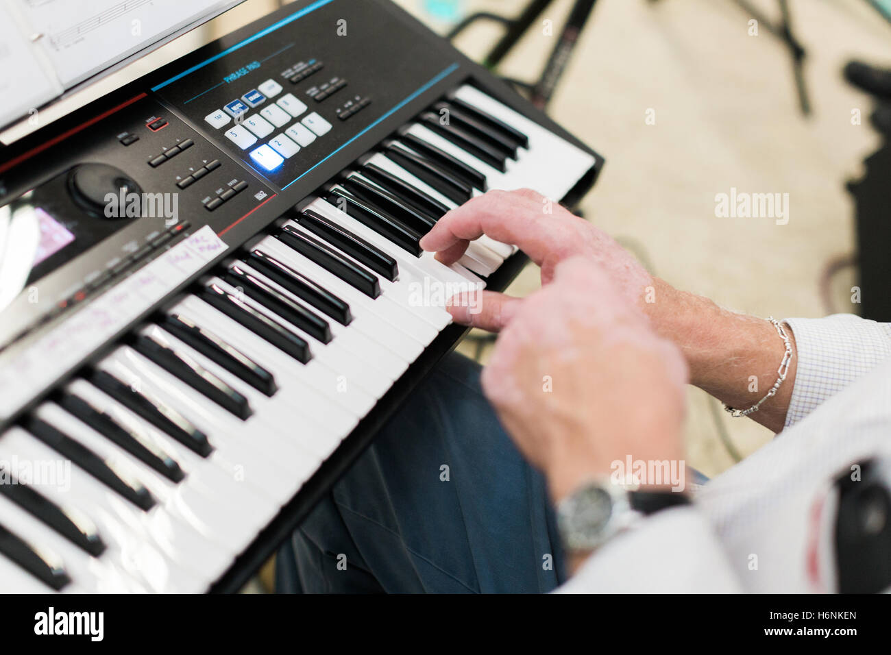 Keyboard player performing on stage live concert Stock Photo Alamy