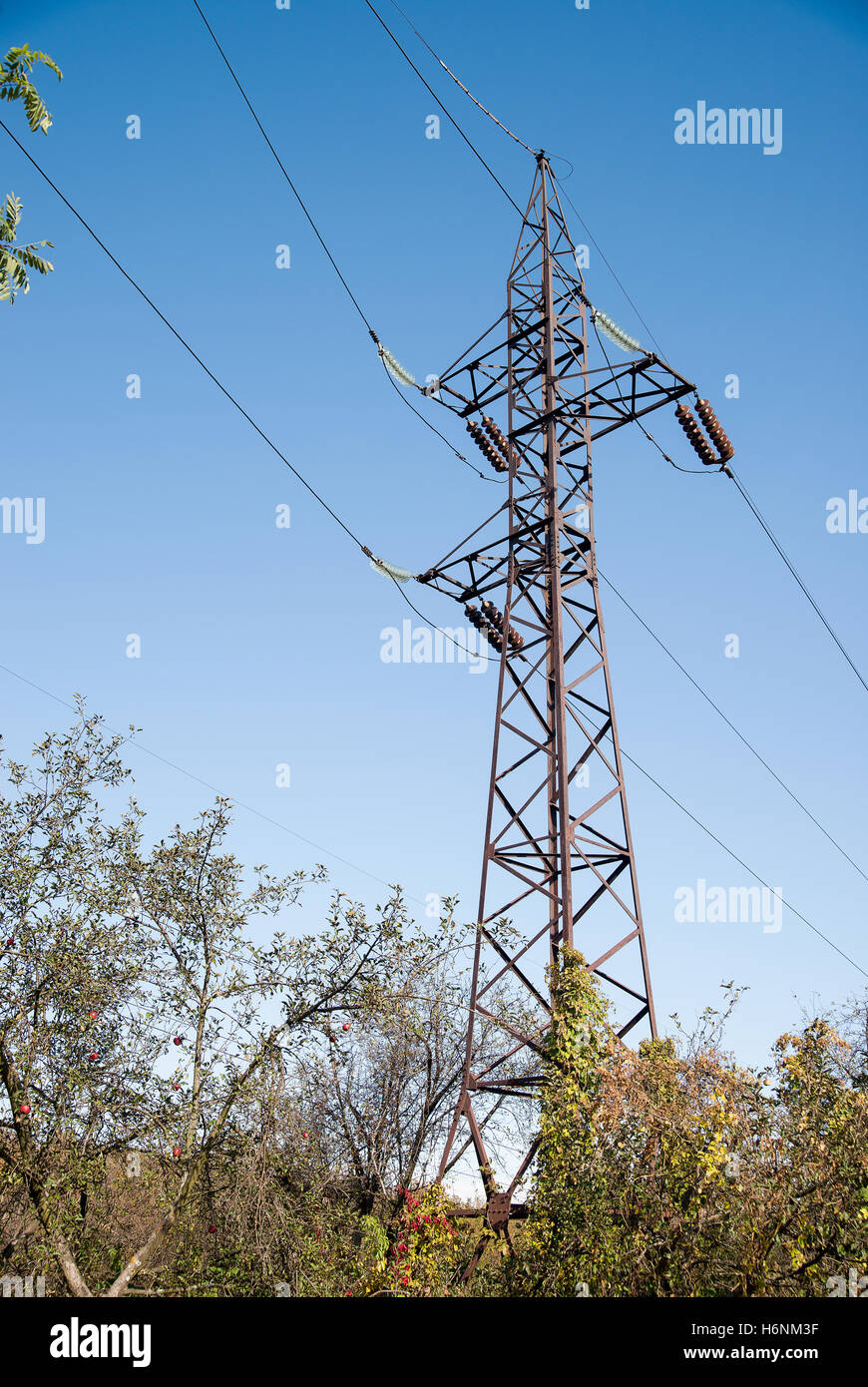 Tower of power-supply system on the background of blue sky Stock Photo ...
