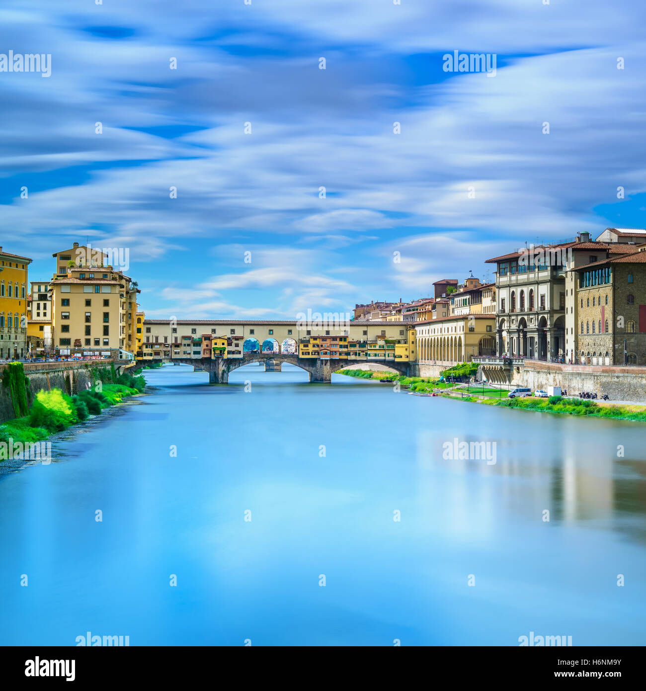 Ponte Vecchio on sunset, old bridge, medieval landmark on Arno river. Florence, Tuscany, Italy. Long exposure photography. Stock Photo