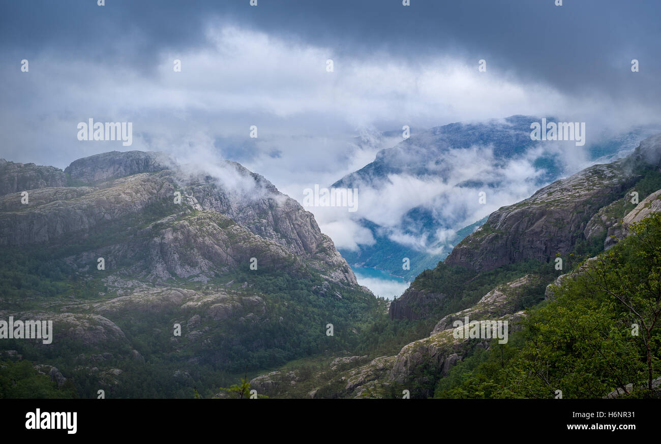Norwegian landscape, rocks and mountains of Lysefjord in clouds Stock ...