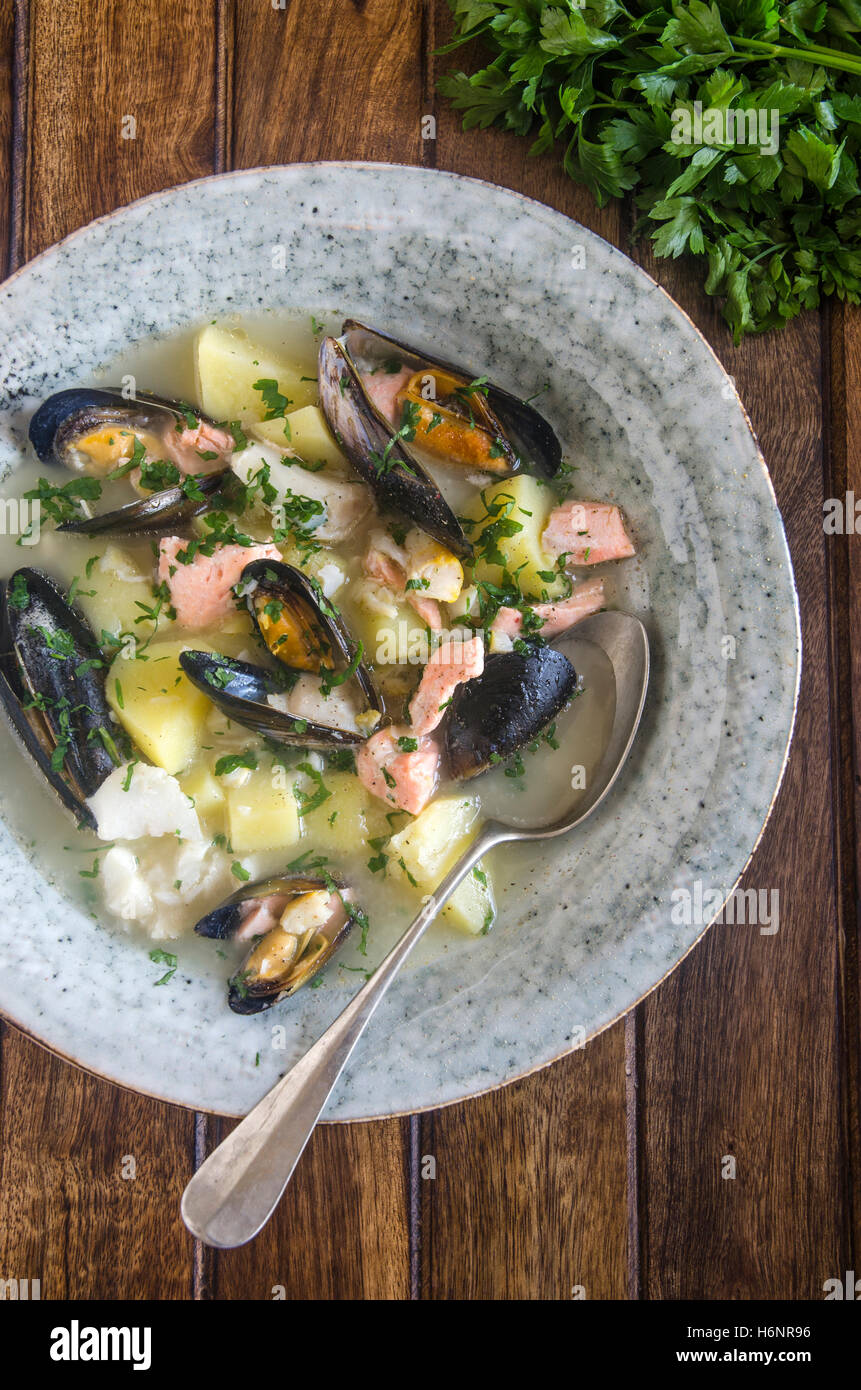Freshly made creamy fish and mussel soup Stock Photo Alamy