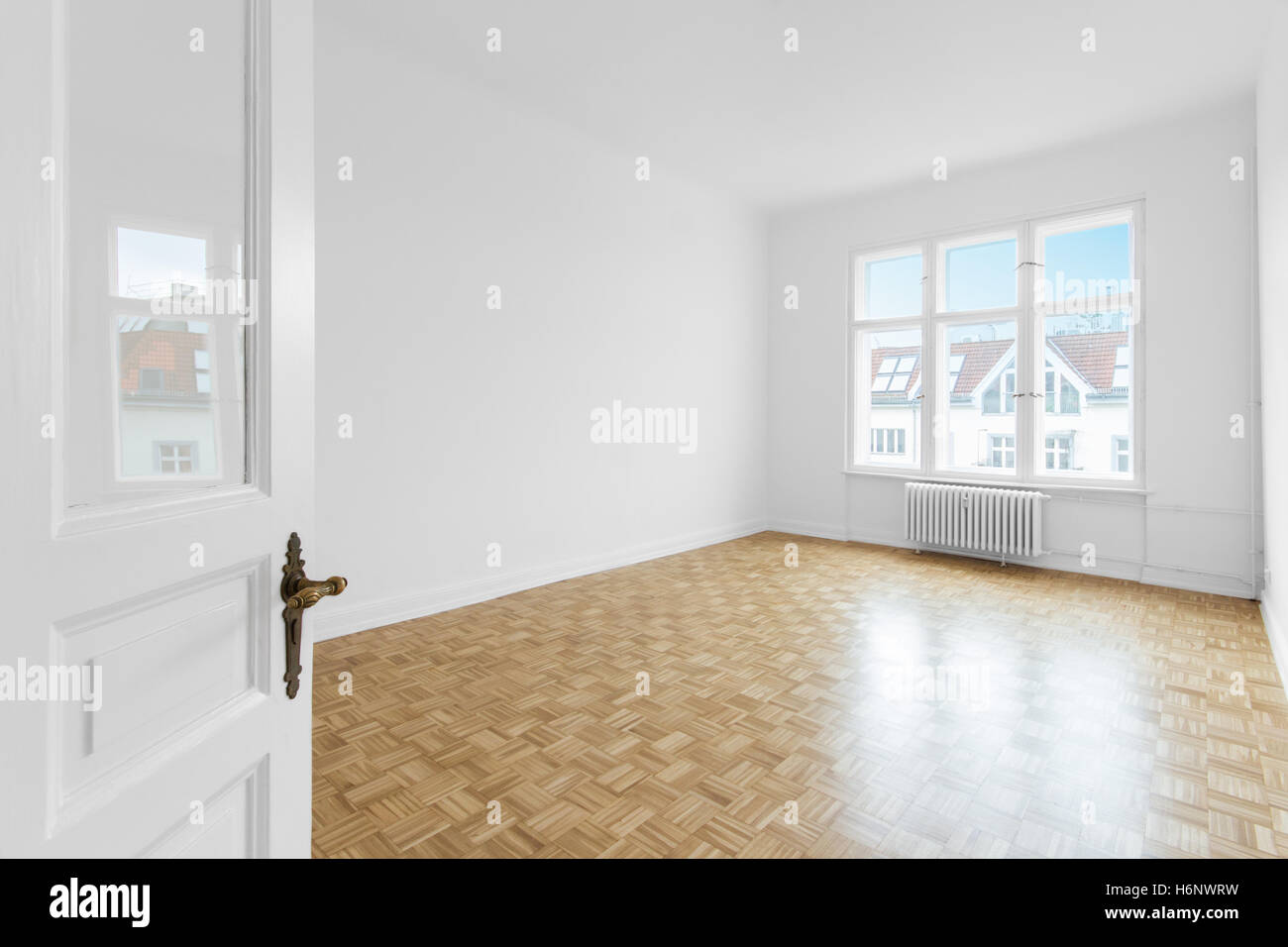 empty room with parquet floor after renovation Stock Photo