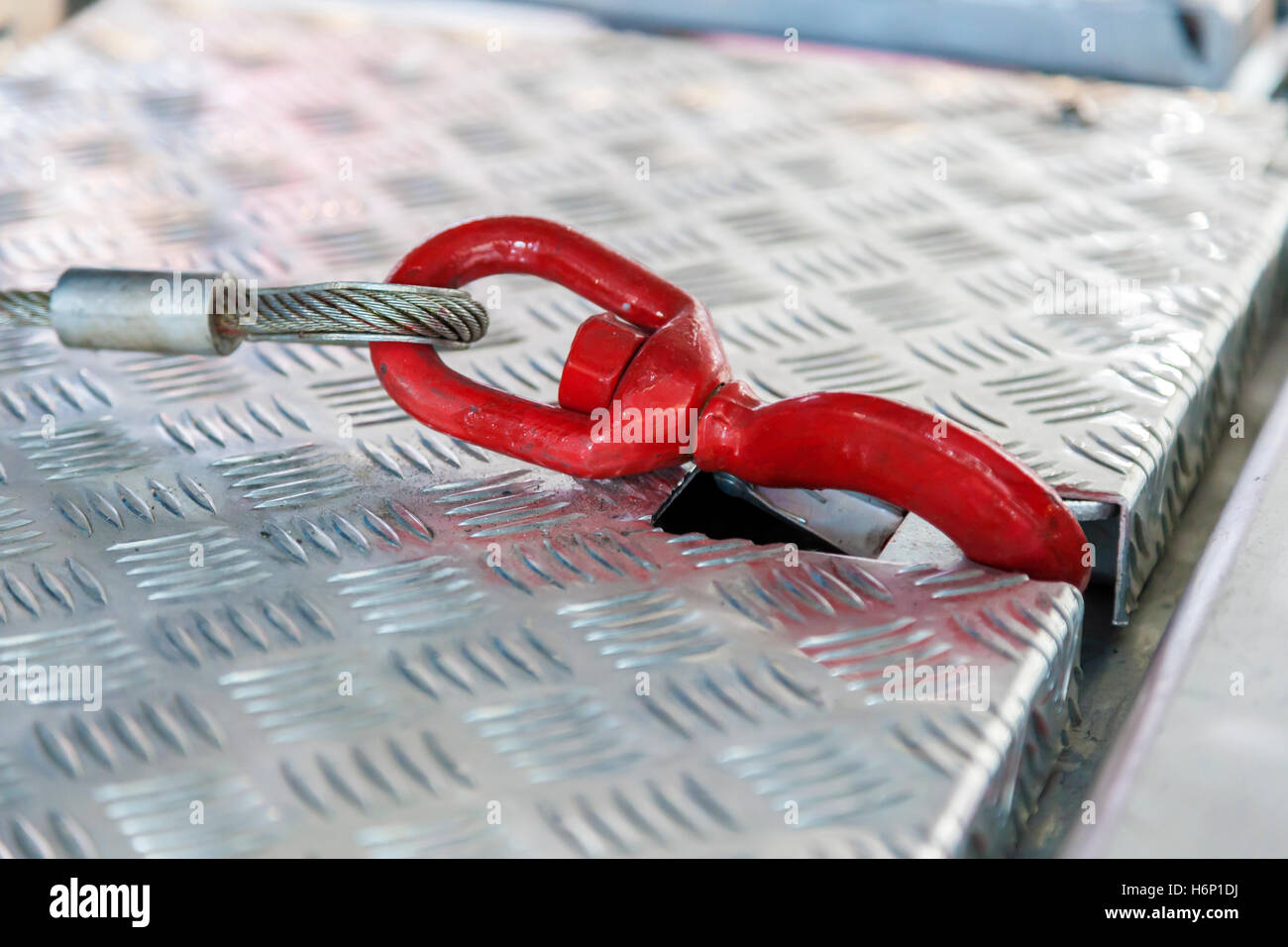 Secure truck load hook with a steel cable Stock Photo