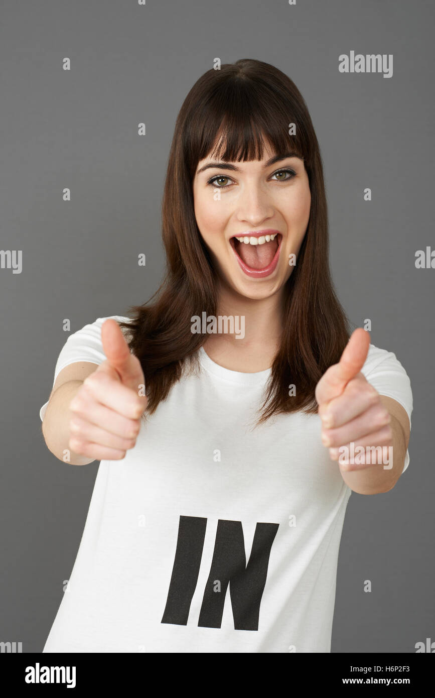 Young Woman Supporter Wearing T Shirt Printed With IN Slogan Stock Photo