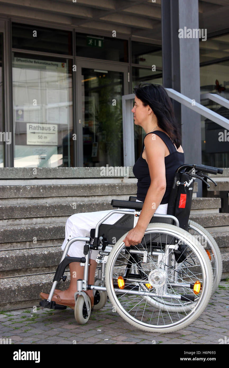 Woman in wheelchair on stairs hi-res stock photography and images - Alamy