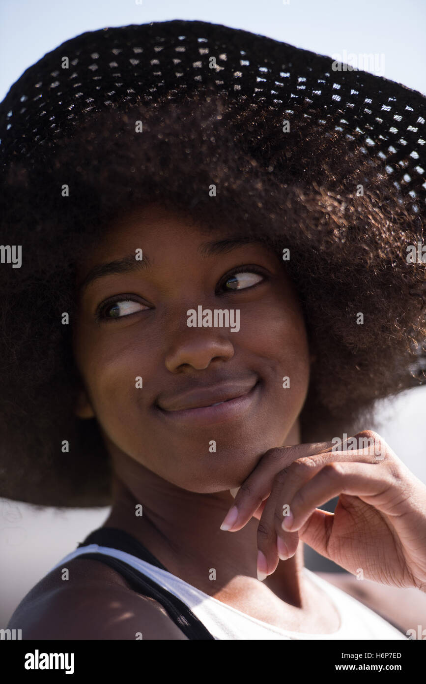 Close up portrait of a beautiful young african american woman smiling ...