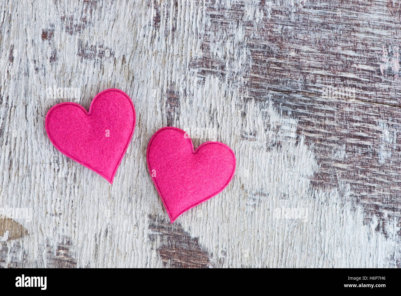 felt hearts on wood Stock Photo - Alamy