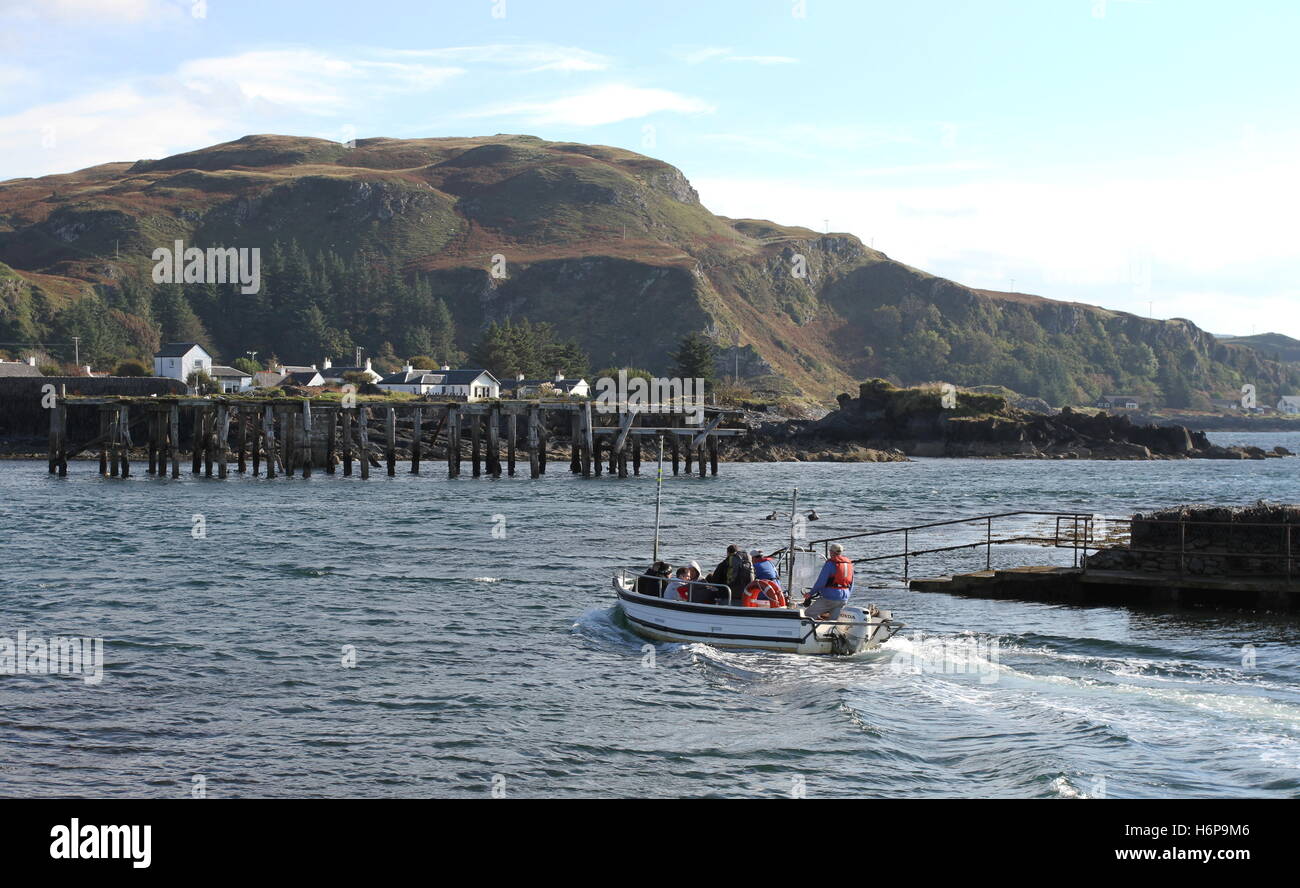Easdale ferry departing Easdale harbour Scotland September 2013 Stock Photo