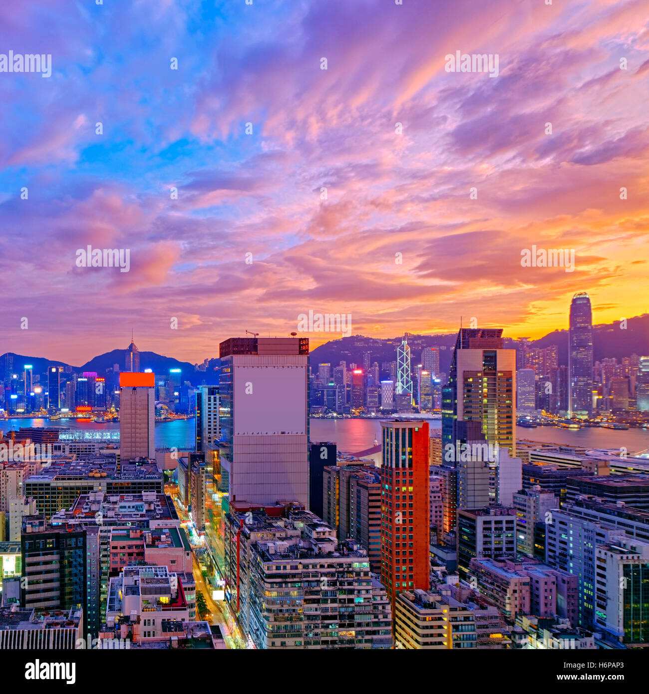 Hong Kong skyline at sunset Stock Photo - Alamy