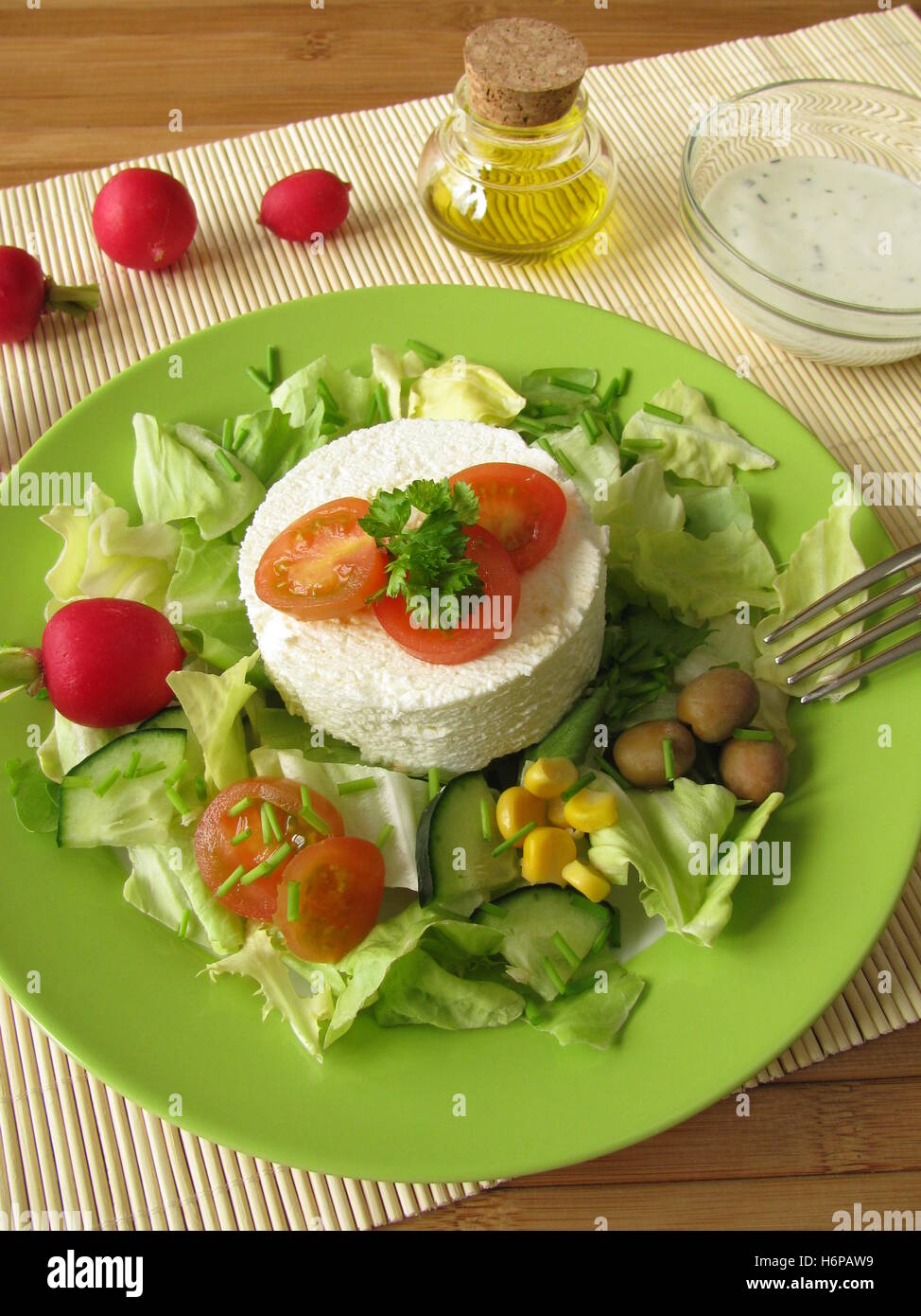 goat cheese on salad Stock Photo
