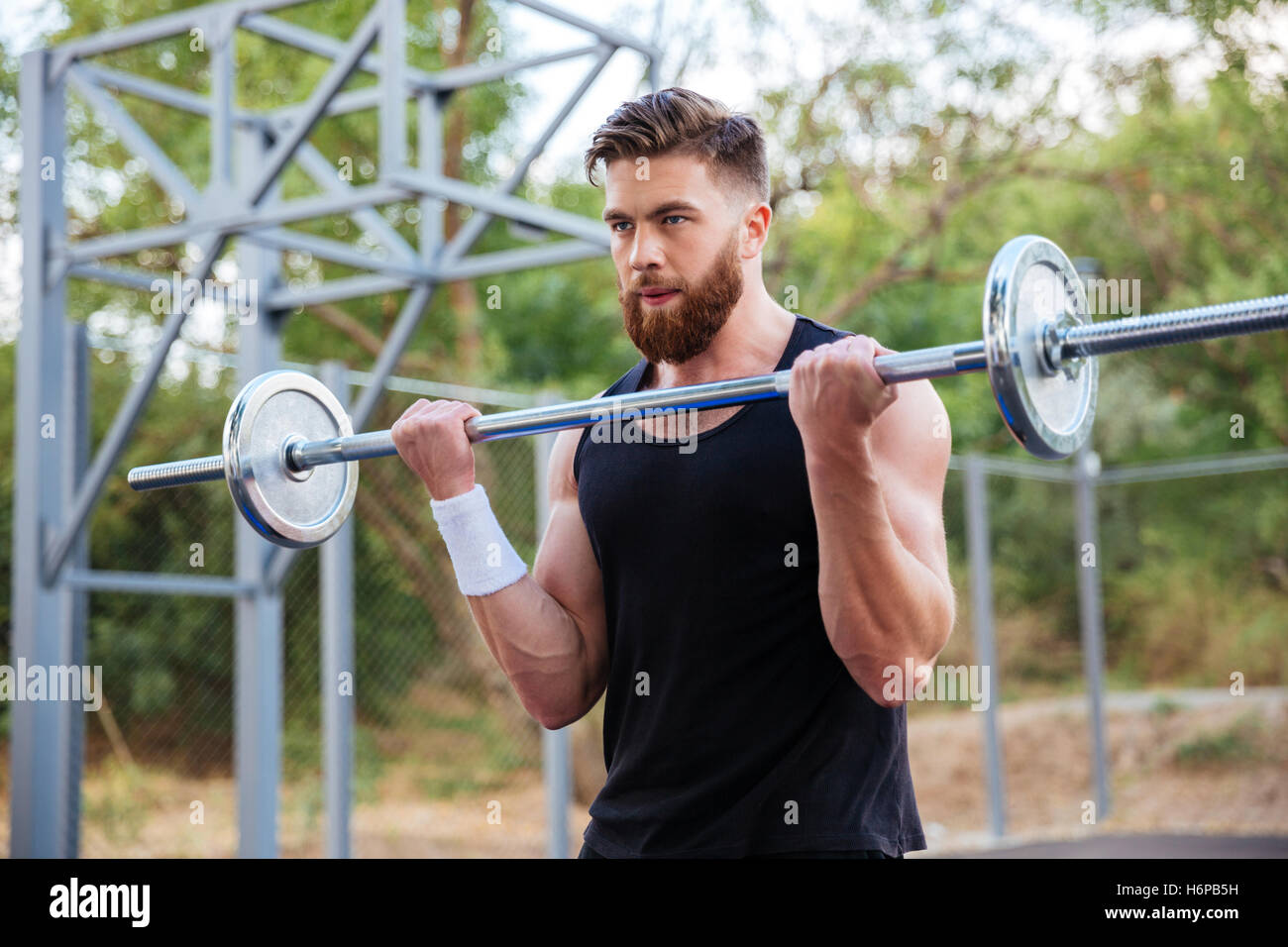 Serious muscular young bearded hi-res stock photography and images - Alamy