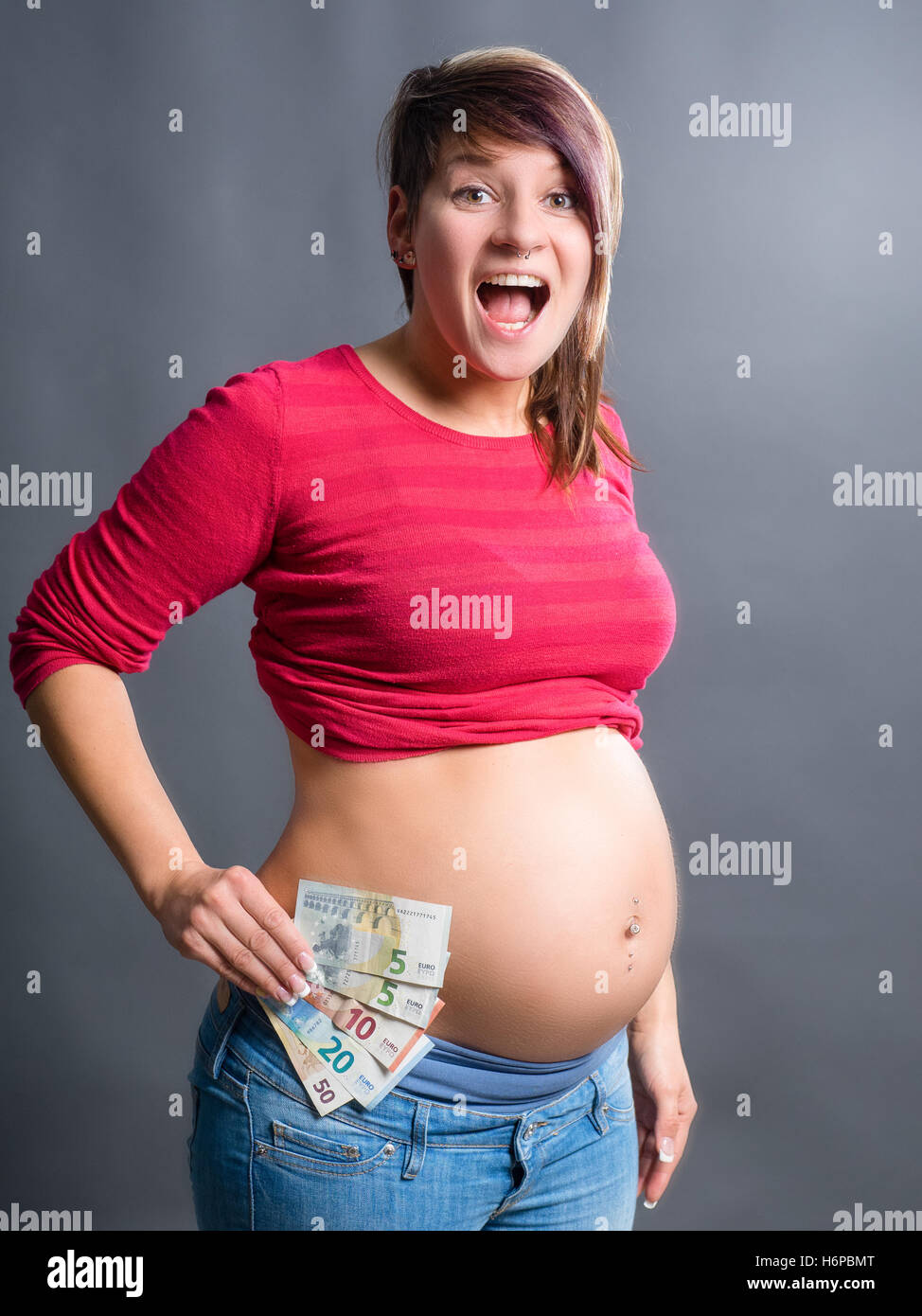Pregnant woman is very happy without money problems Stock Photo