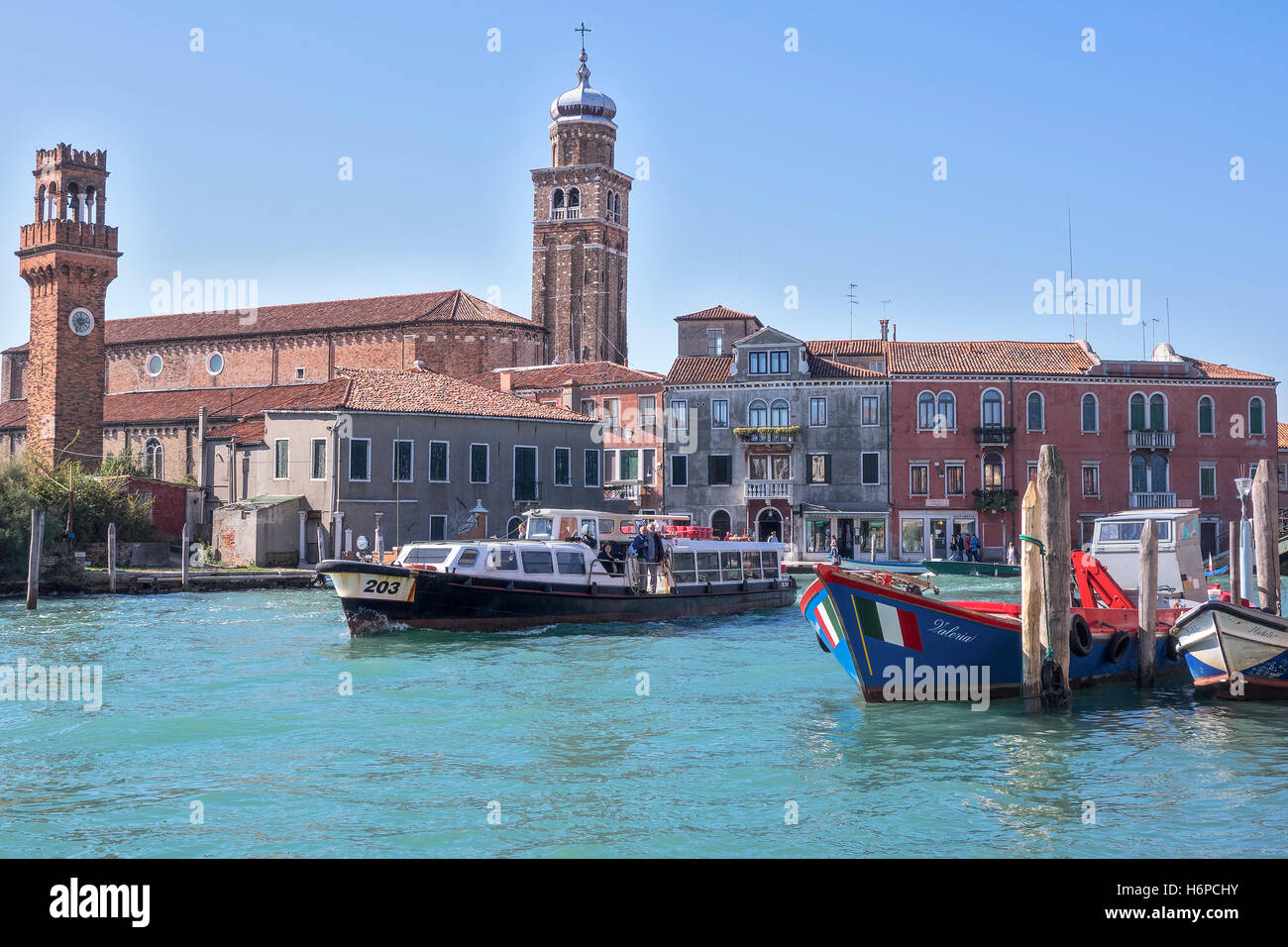 Water Bus Passing Along The Canal At Murano Venice Italy Stock Photo
