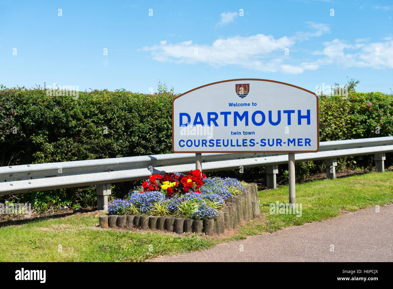 to Dartmouth and twinning sign for Courseulles Sur Mer at the