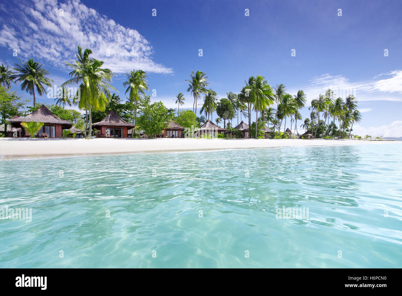 Exotic tropical beach huts hi-res stock photography and images - Alamy