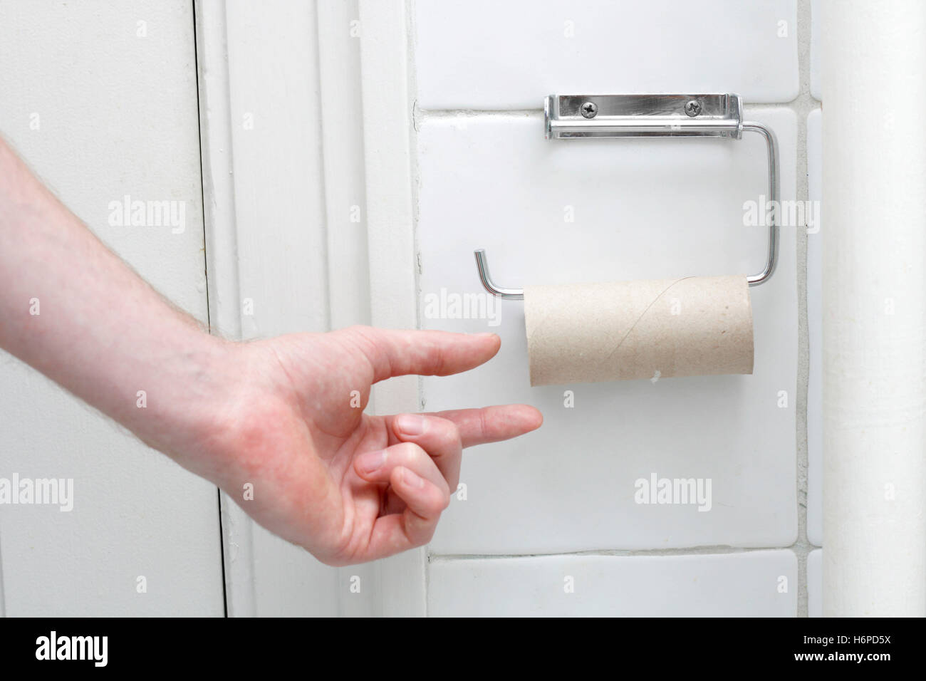 accident no toilet nothing used empty catastrophe lack incident bathroom sheet of paper paper hand give not restroom tissues Stock Photo