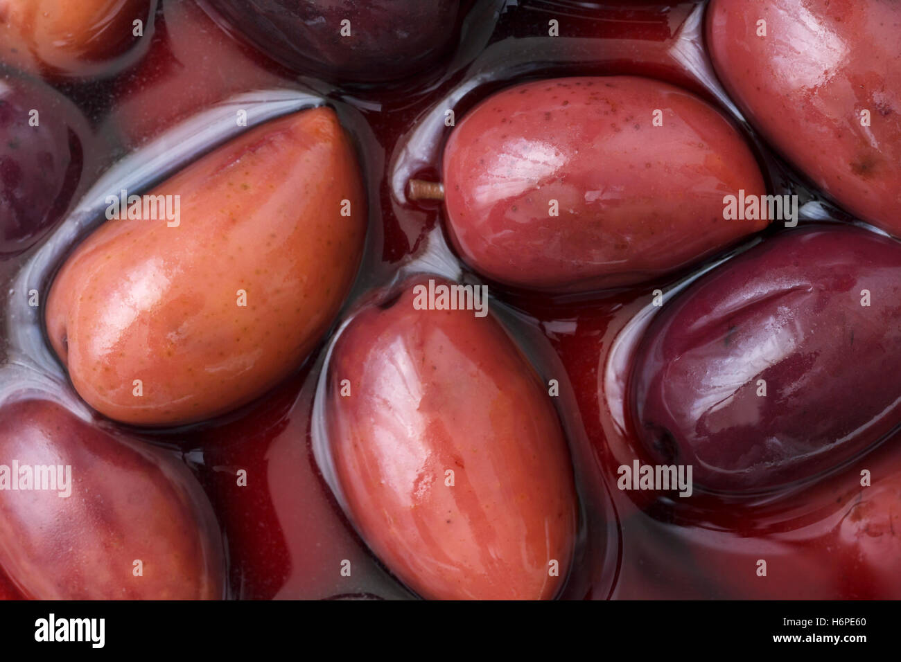 Detail of Greek Kalamata olives in brine. Stock Photo