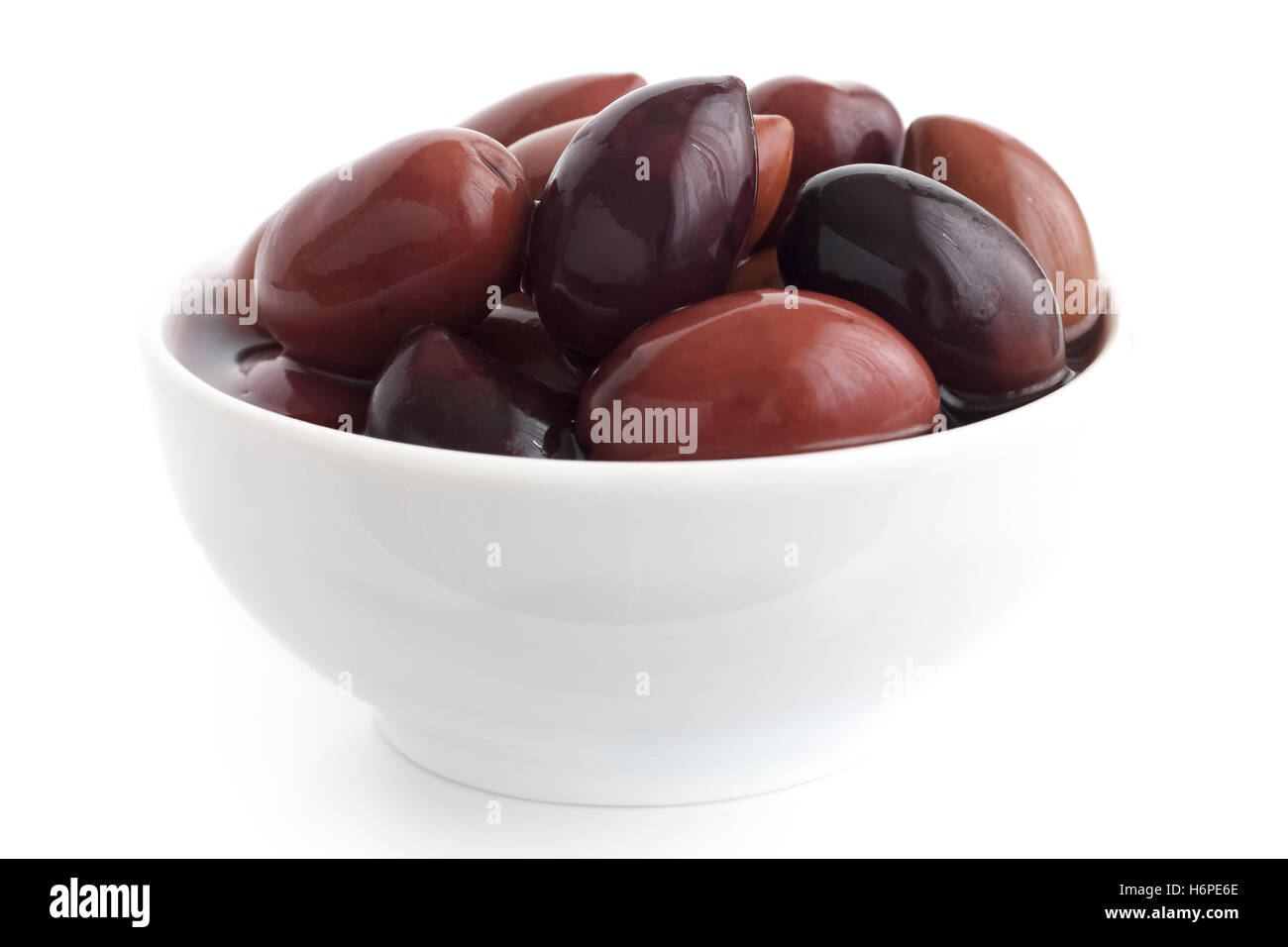 Bowl of Greek Kalamata olives. Isolated on white Stock Photo - Alamy
