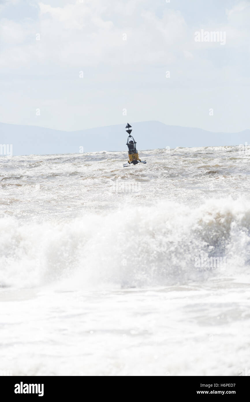 cardinal marker buoy in stormy seas Stock Photo