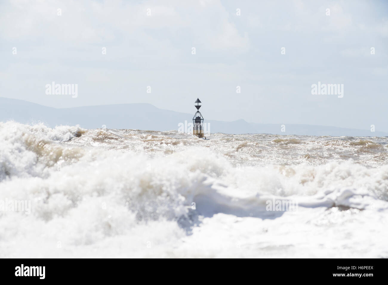 cardinal marker buoy in stormy seas Stock Photo