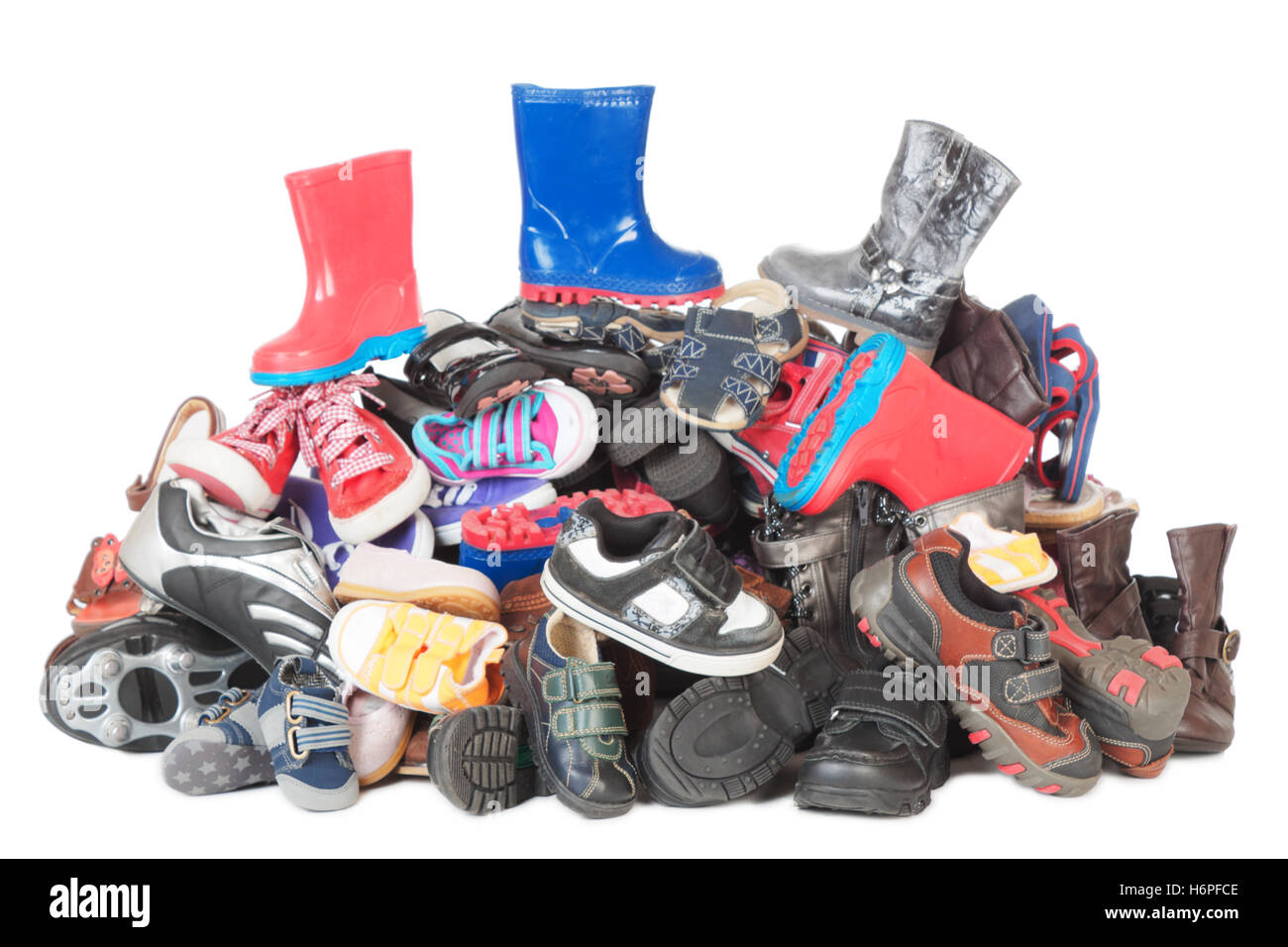 isolated shoes leather stack kid cutout heap pile child boot object objects sport sports isolated colour female male masculine Stock Photo