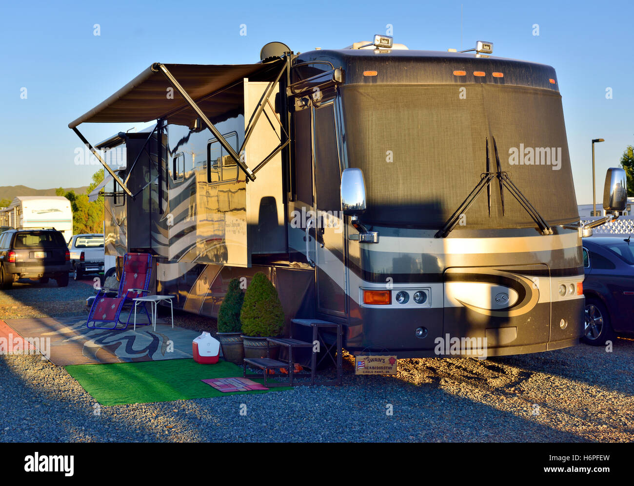 Touring slide out motorhome parked and connected to services in Prescott Valley, Arizona, USA Stock Photo