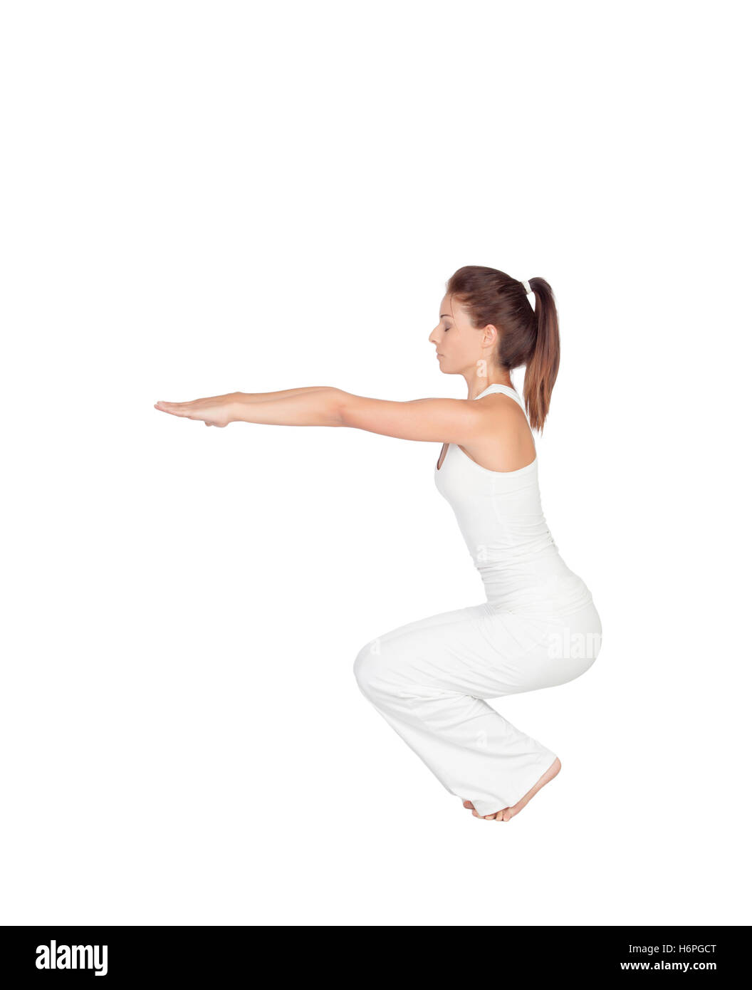 Beautiful woman doing yoga isolated on white background Stock Photo - Alamy
