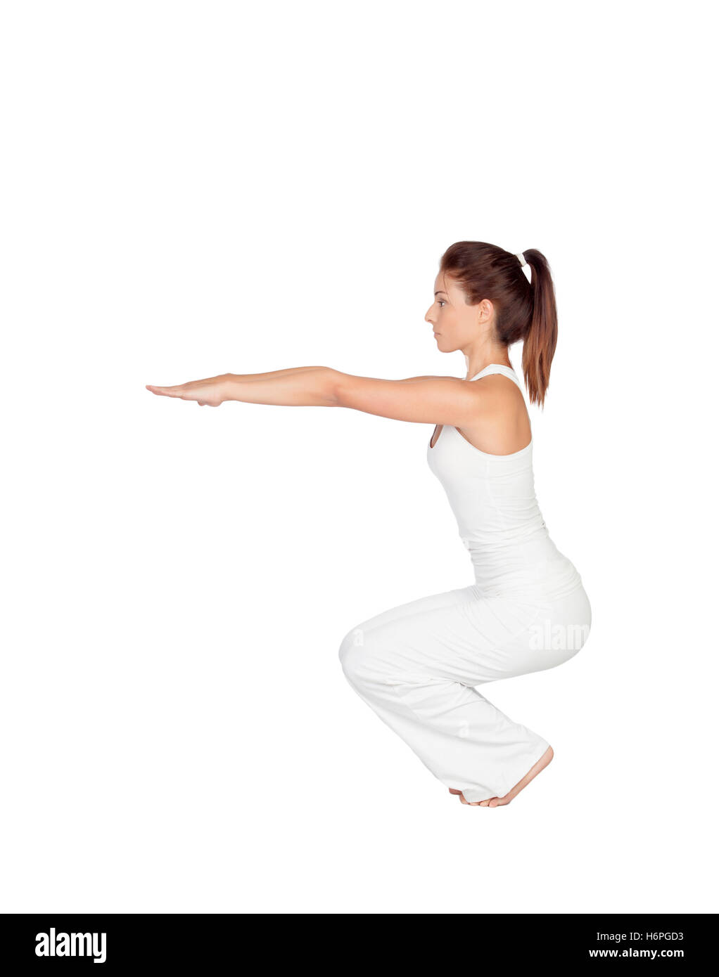 Beautiful woman doing yoga isolated on white background Stock Photo - Alamy