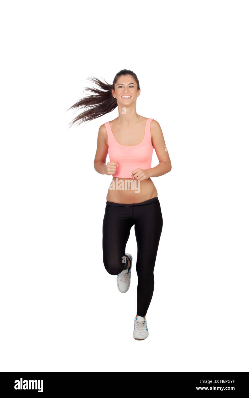 Attractive brunette girl running isolated on a white background Stock Photo