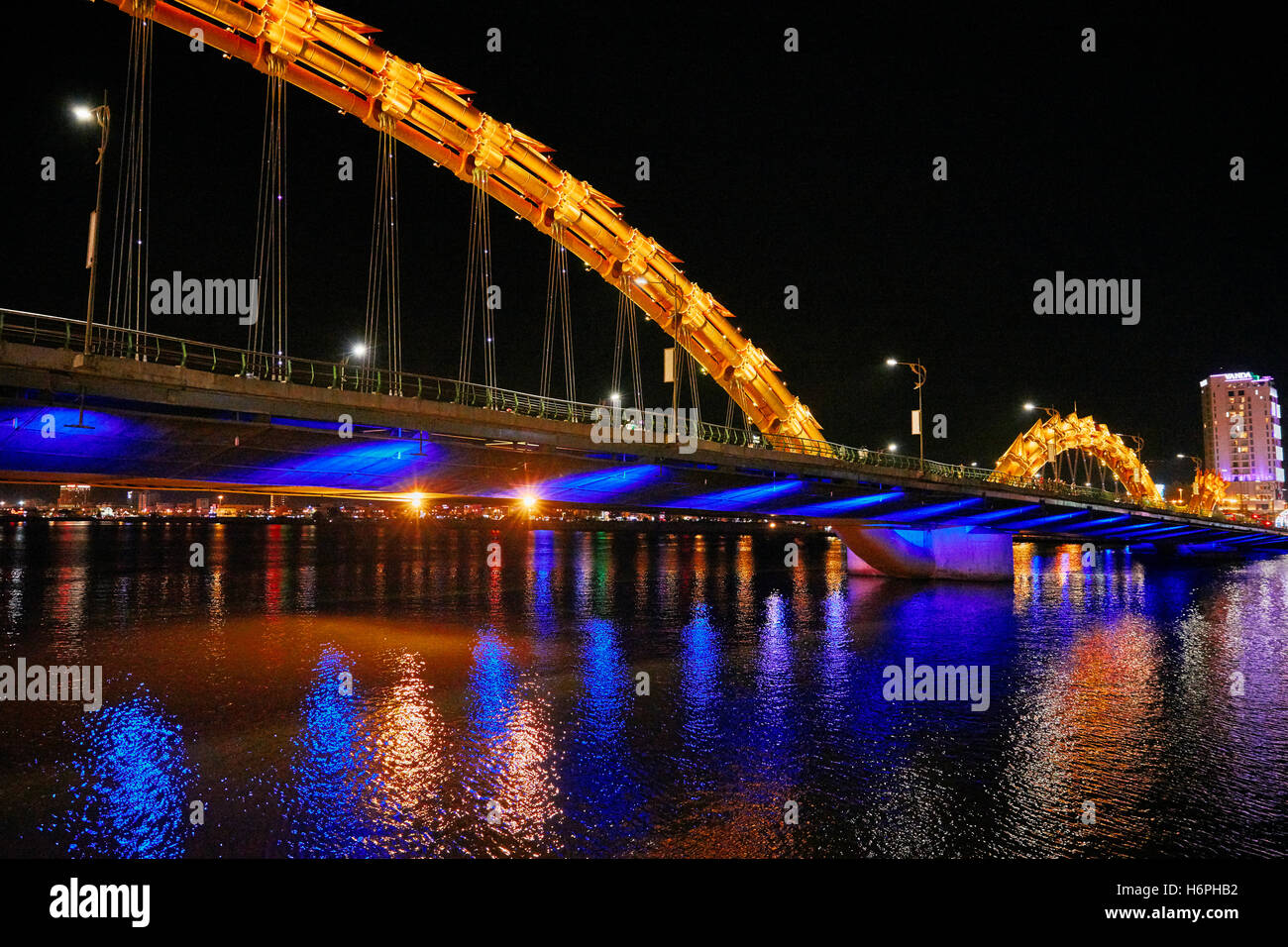 Dragon Bridge (Cau Rong) over the River Han at dusk. Da Nang city, Vietnam. Stock Photo