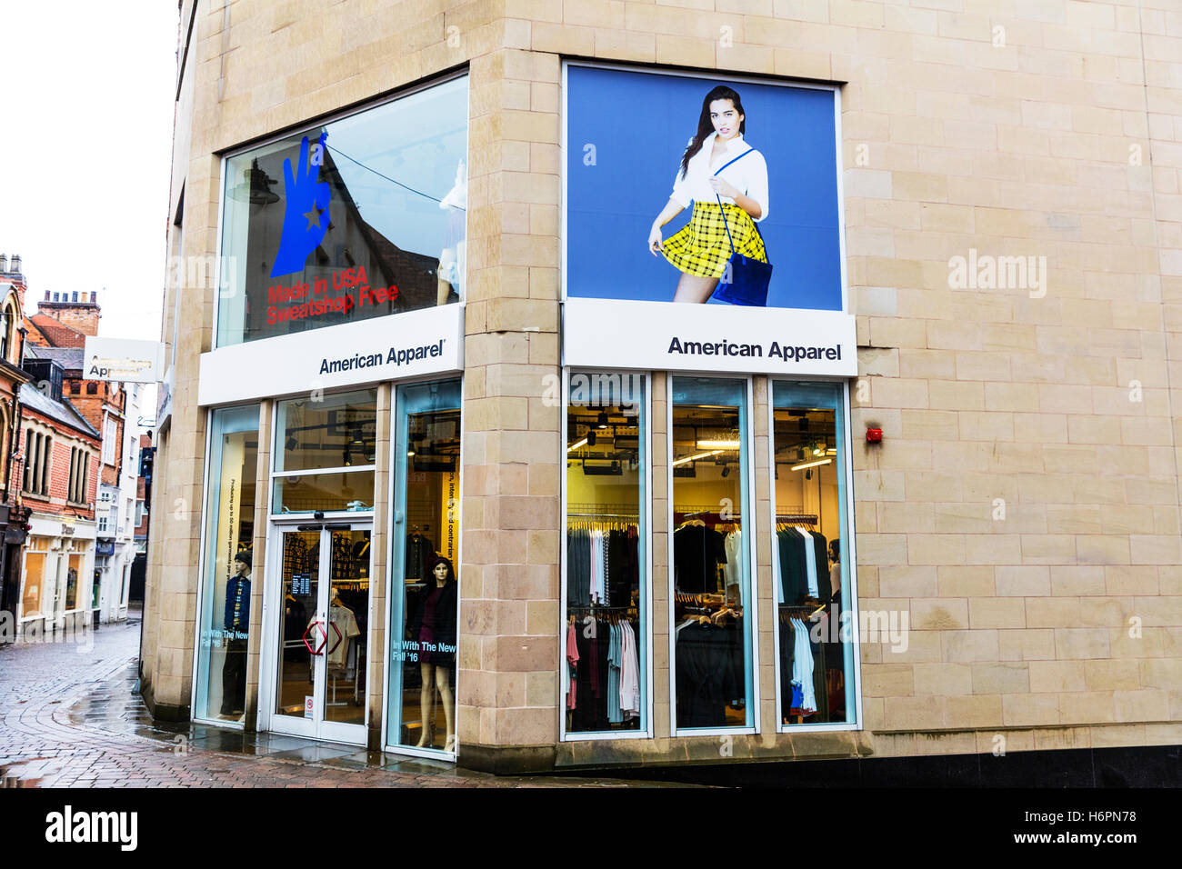 American Apparel clothes shop clothing store high street shops Nottingham UK GB England sign exterior front facade signs stores Stock Photo