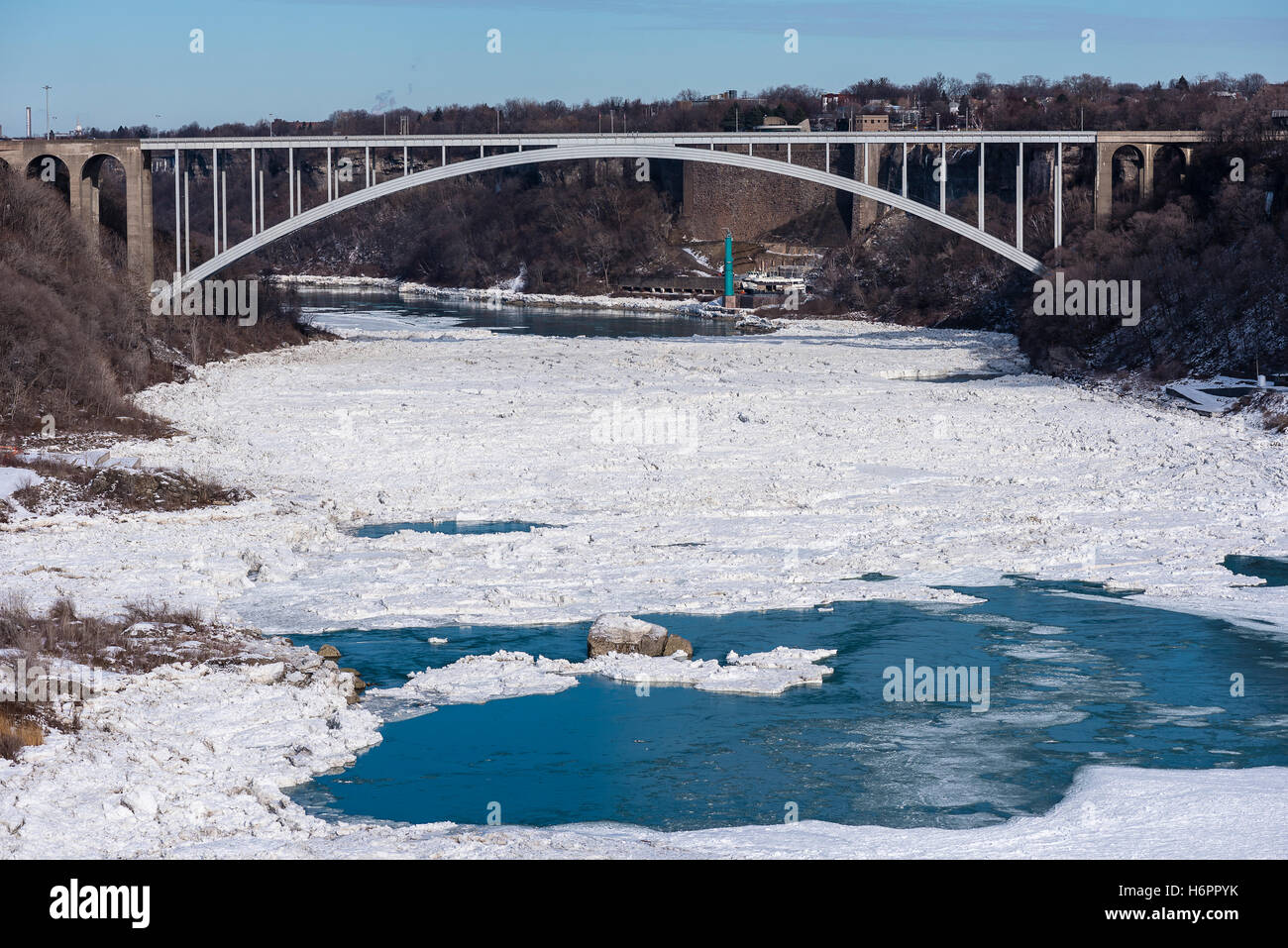 The Rainbow bridge an international border crossing joining Canada to the USA spans the frozen