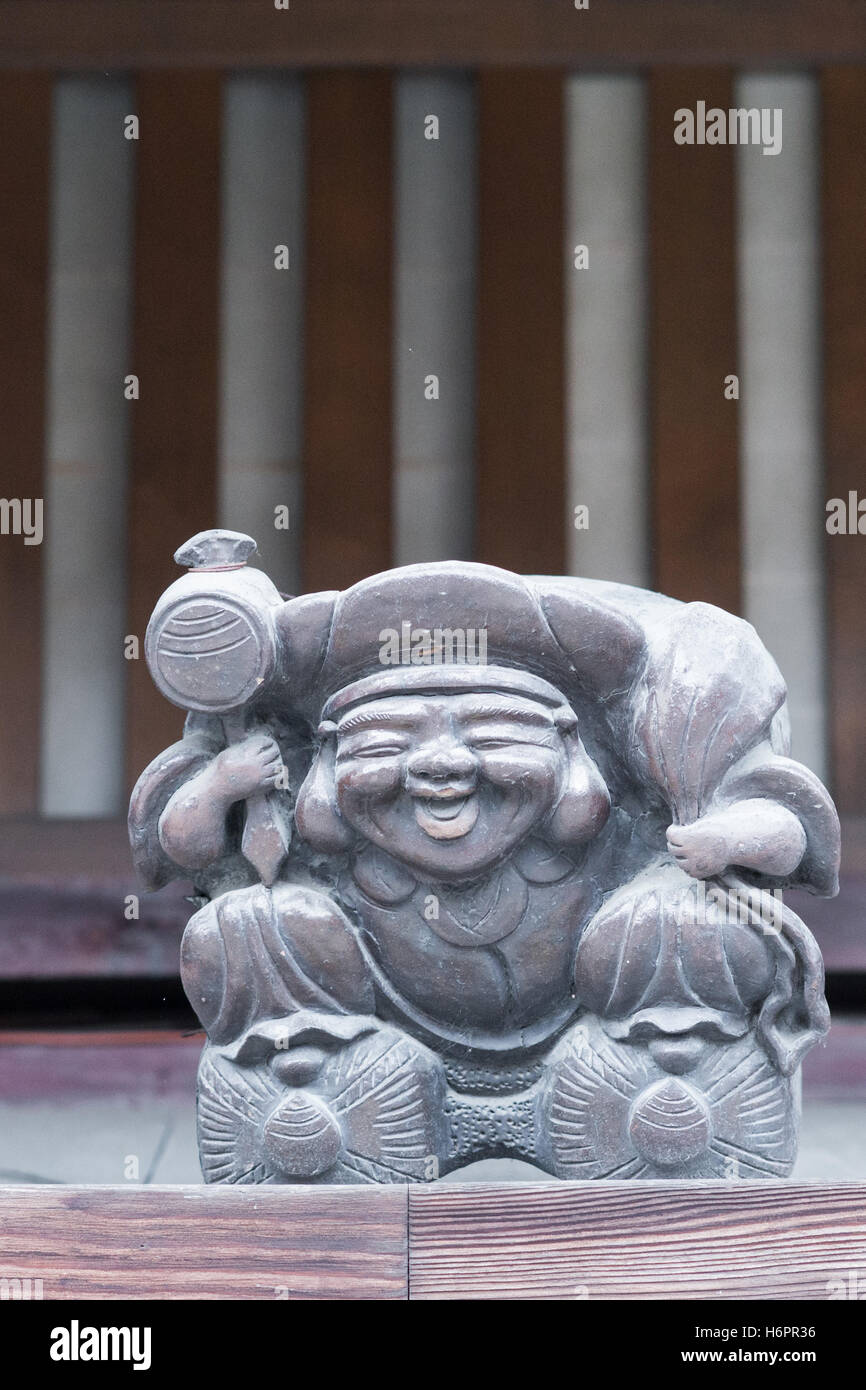 Wooden statue of Ebisu, Japanese god of luck Stock Photo Alamy