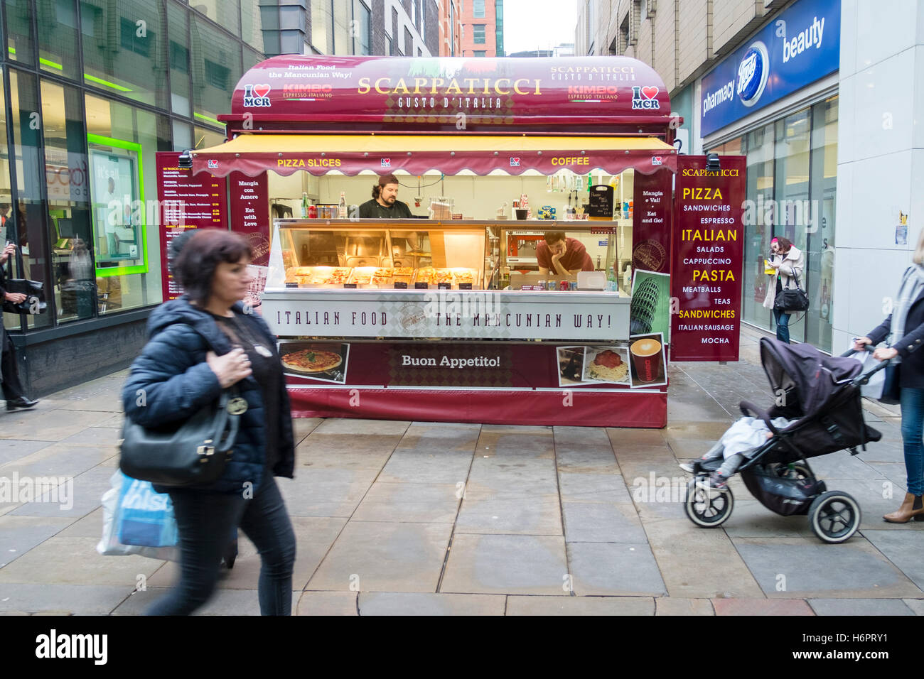 Hot food stall on Market St, Manchester, UK Stock Photo Alamy