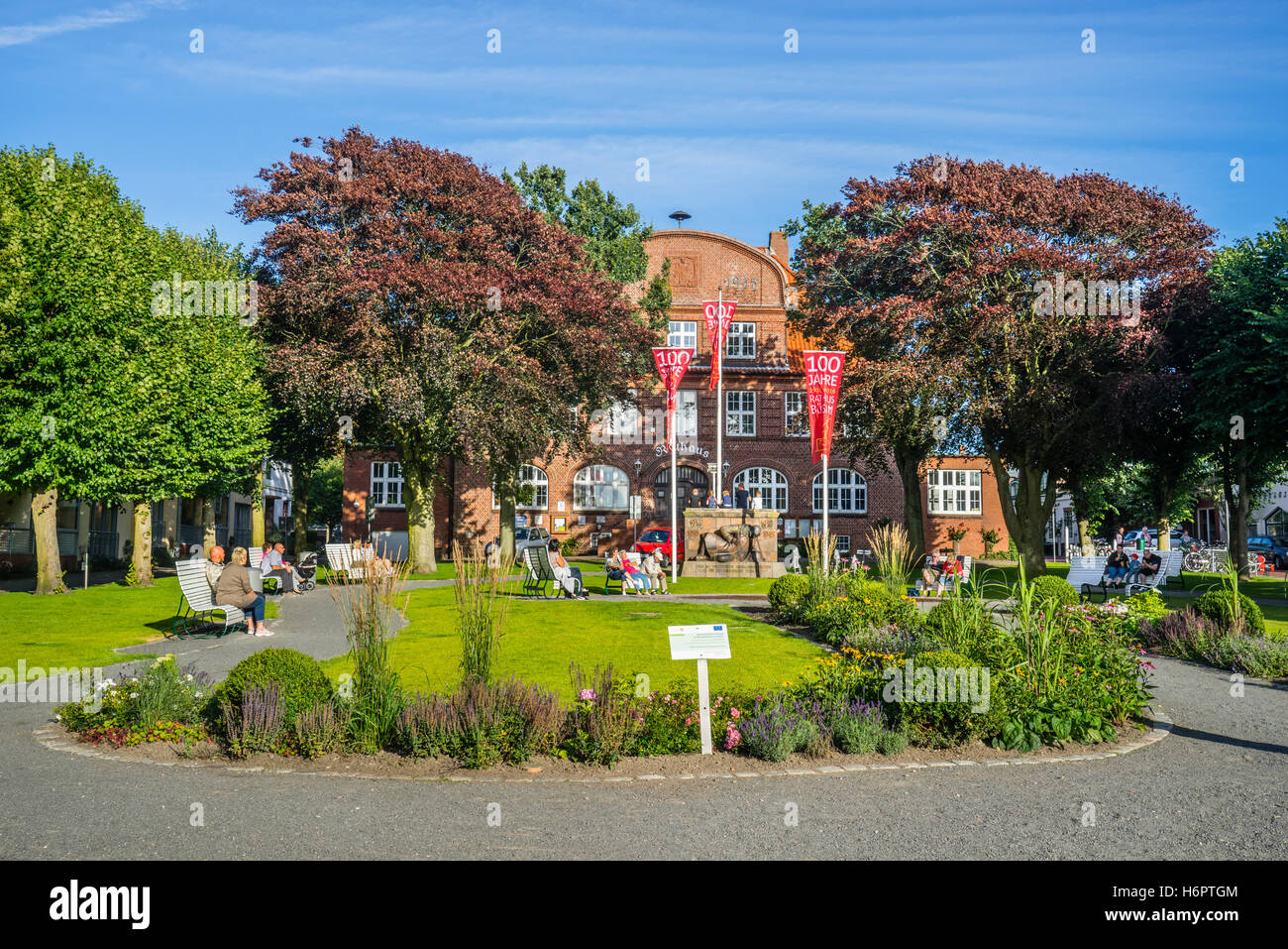 Germany, Schleswig-Holstein, Dithmarschen, view of Büsum town hall and town hall park with impressive Copper Beech trees Stock Photo