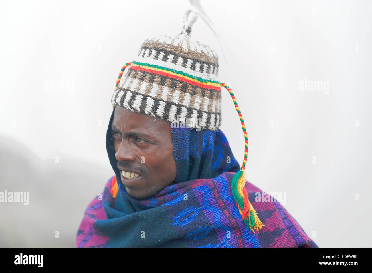 DEBRE BIRHAN, ETHIOPIA-MARCH 30: Amharic man wears horse hair hat as example of the local use for headdresses. Stock Photo