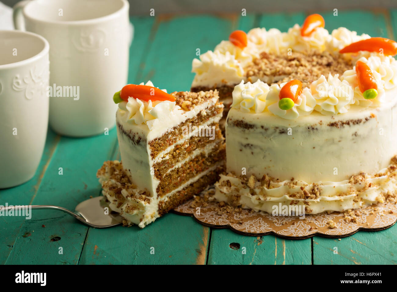 Slice of carrot cake with cream cheese frosting Stock Photo