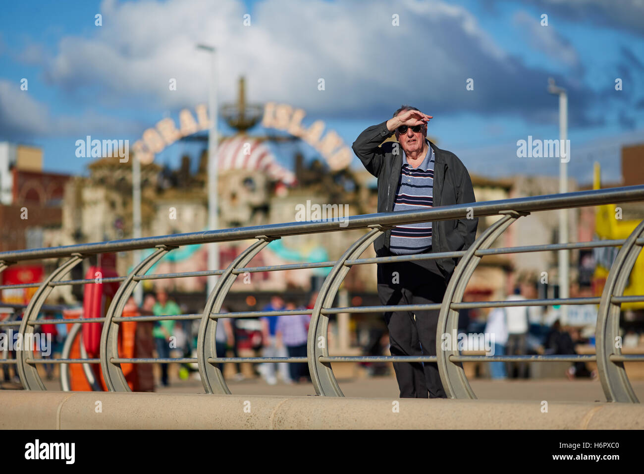 Blackpool sea front man tourist  Holiday sea side town resort Lancashire tourist attractions  landmark sea front attraction Tour Stock Photo