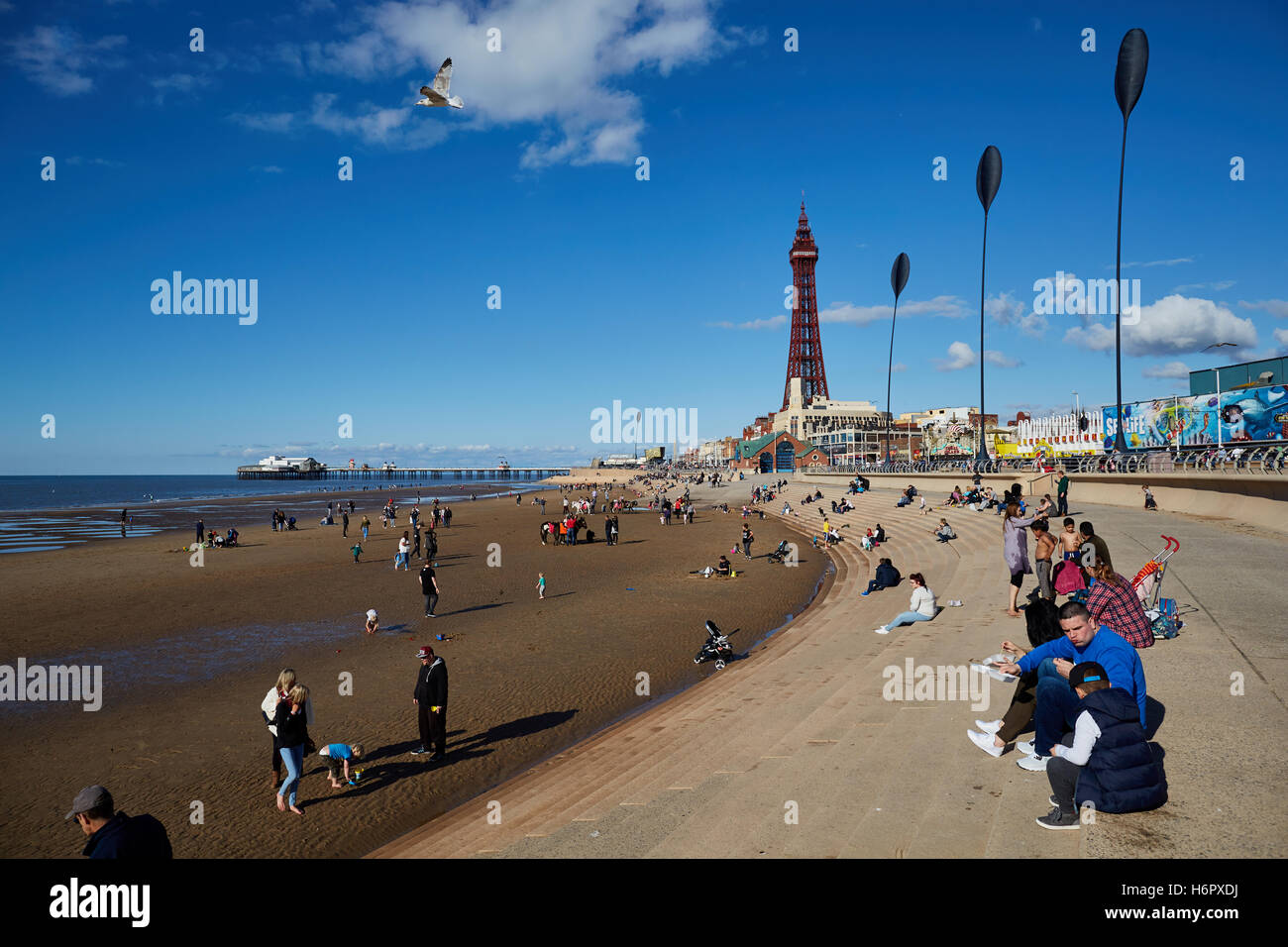 Blackpool busy crowded beach sunny day    Holiday  resort Lancashire tourist attractions sea front attraction Tourists traveling Stock Photo