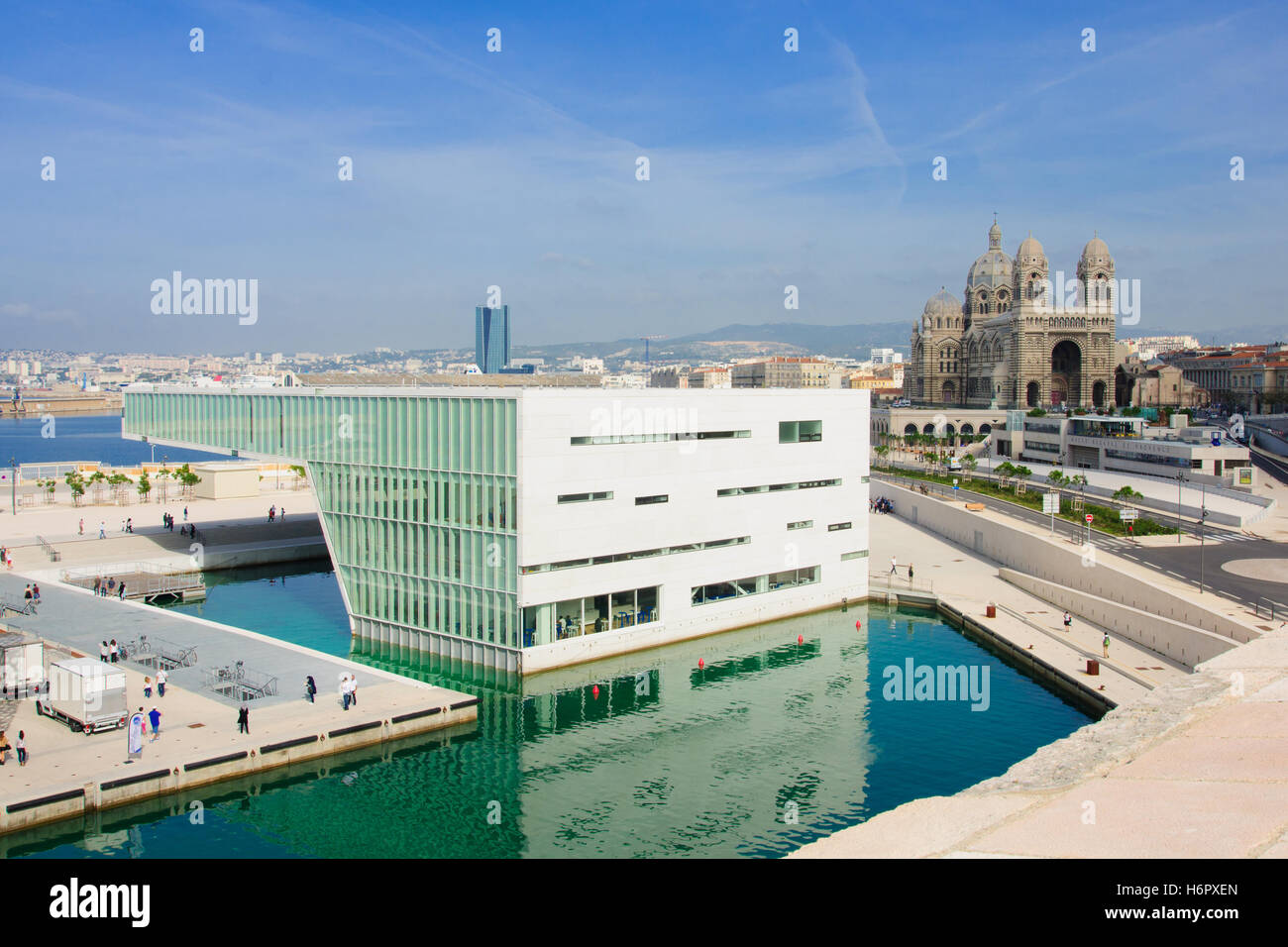 MARSEILLES, FRANCE - OCTOBER 20, 2014: The Villa Mediterranee and the Cathedrale de la Major (main cathedral), in Marseilles, Fr Stock Photo