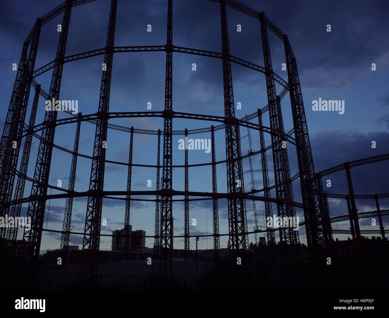 A gas holder at sunset in London, UK Stock Photo Alamy